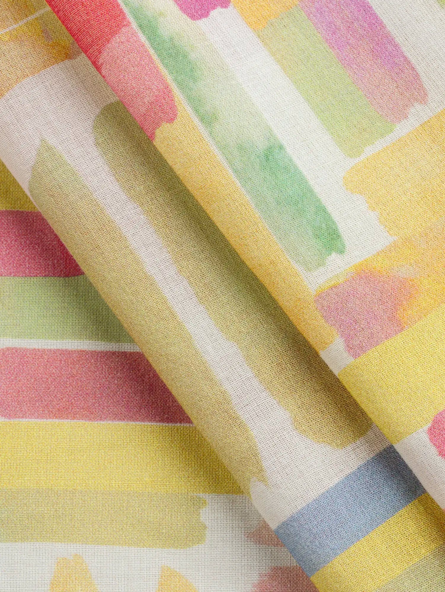 F-COT445-Large-Watercolour-Print-BCI-Cotton-Voile-White-and-Multicolour-Core-Fabrics-fold.webp