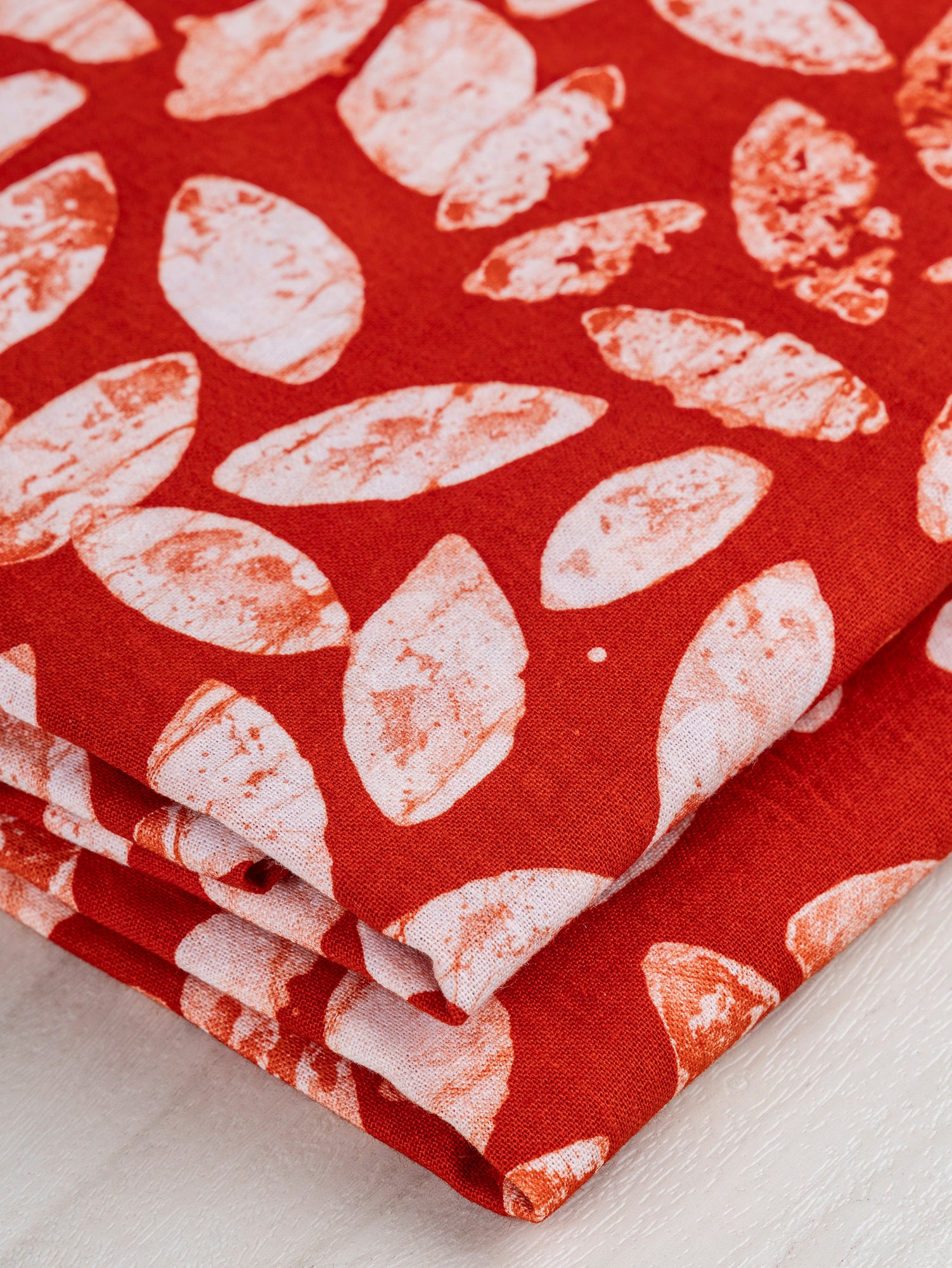 F-COT323-Leaf-Artisanal-Cotton-Batik-Red-White-Core-Fabrics-fold