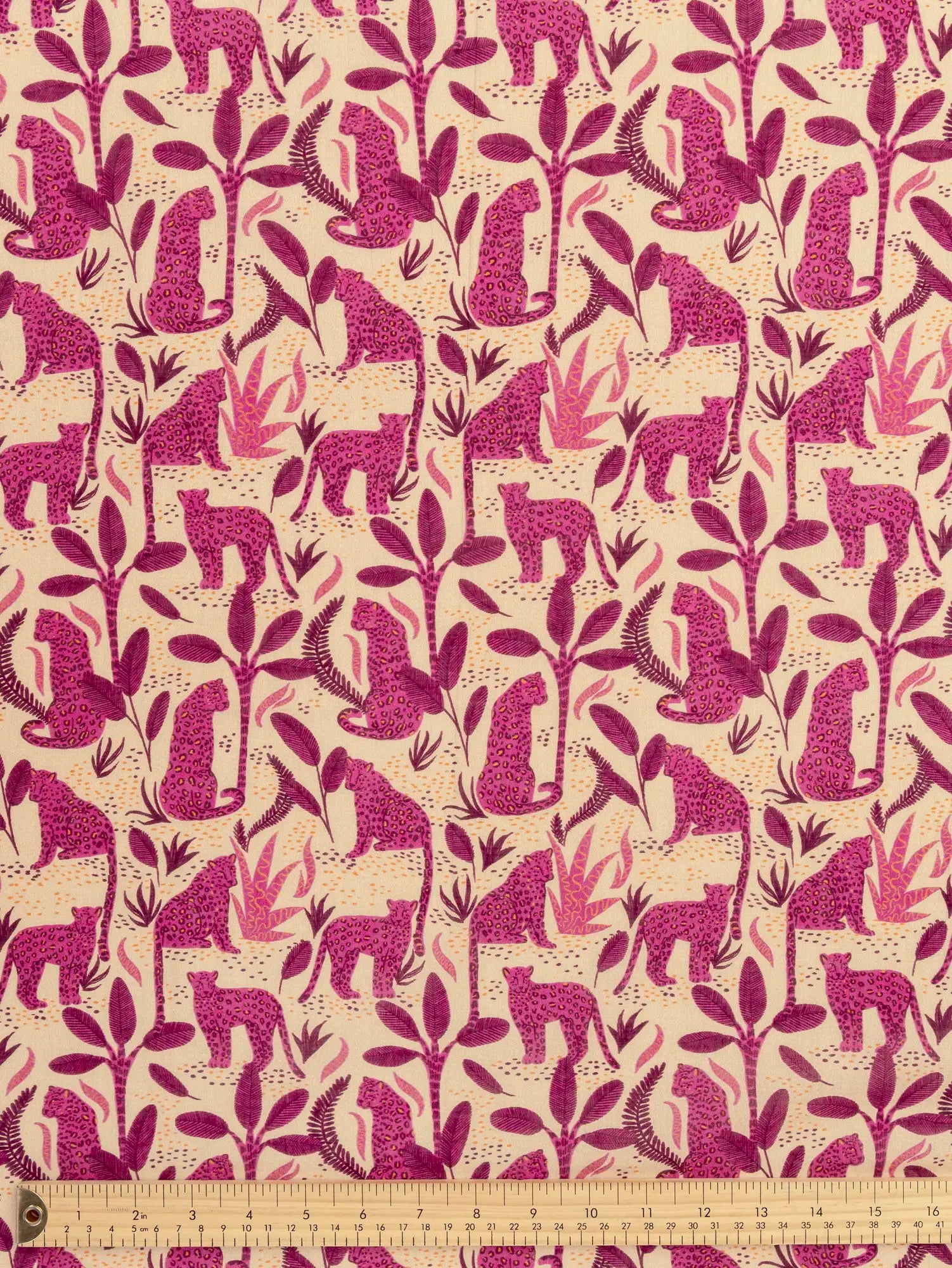 F-COT434-Leopard-Print-Cotton-Voile-Cream-Magenta-and-Apricot-Core-Fabrics-ruler.webp