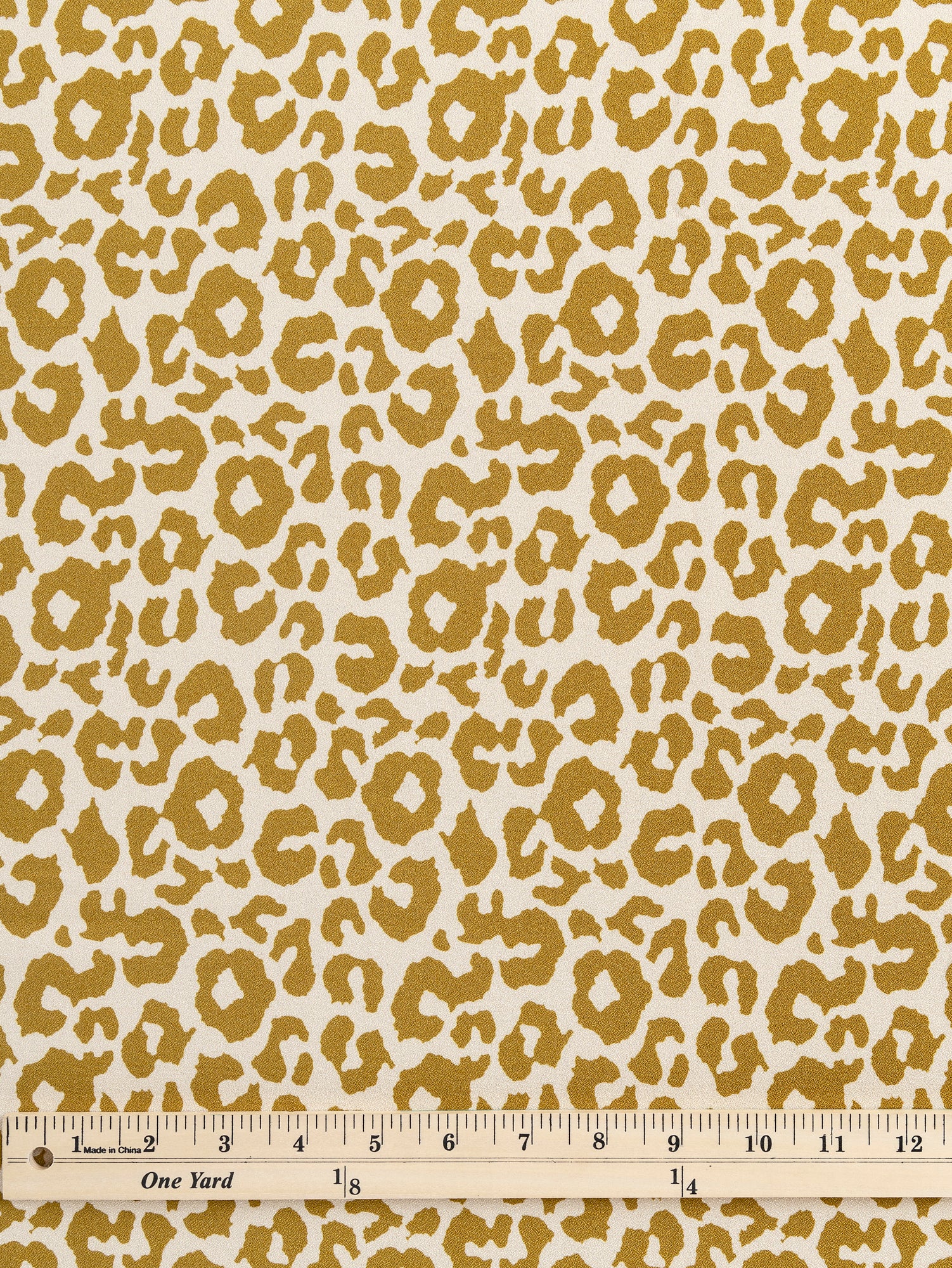F-VIS235-Leopard-Print-Ecovero-Viscose-Crepe-Cream-Gold-Core-Fabrics-ruler