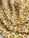 F-VIS235-Leopard-Print-Ecovero-Viscose-Crepe-Cream-Gold-Core-Fabrics-scrunched