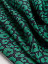 F-COT327-Leopard-Print-Stretch-Cotton-Bottomweight-Black-Green-Core-Fabrics-scrunched