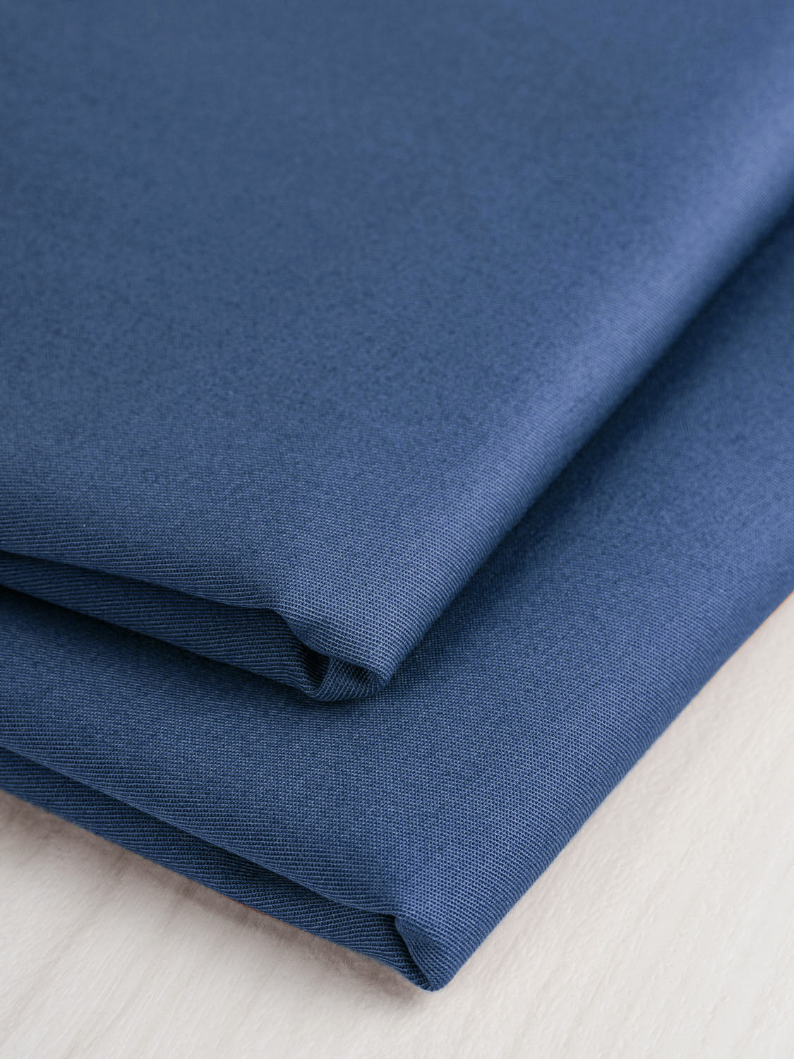 F-COT154-009 - Lightweight Organic Cotton Stretch 6 oz Twill - Ocean Blue-Core-Fabrics-fold
