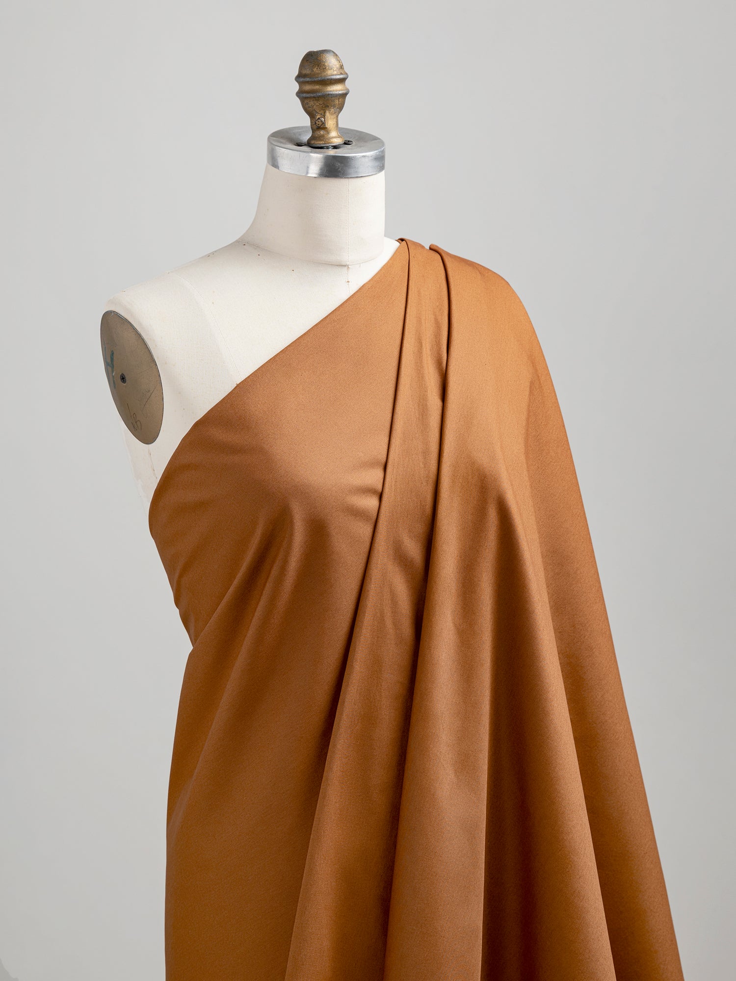 F-COT137-024-Lightweight-Silky-Cotton-Poplin-Caramel-Core-Fabrics-draped.JPG