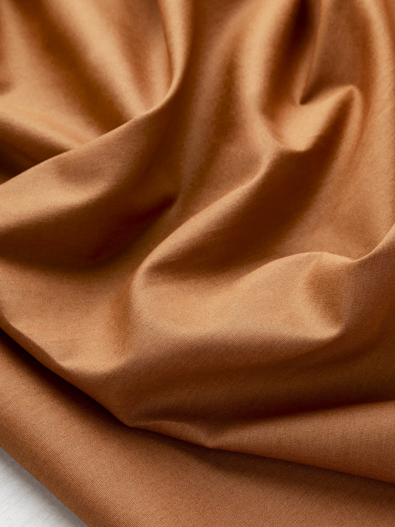 F-COT137-024-Lightweight-Silky-Cotton-Poplin-Caramel-Core-Fabrics-scrunched.JPG