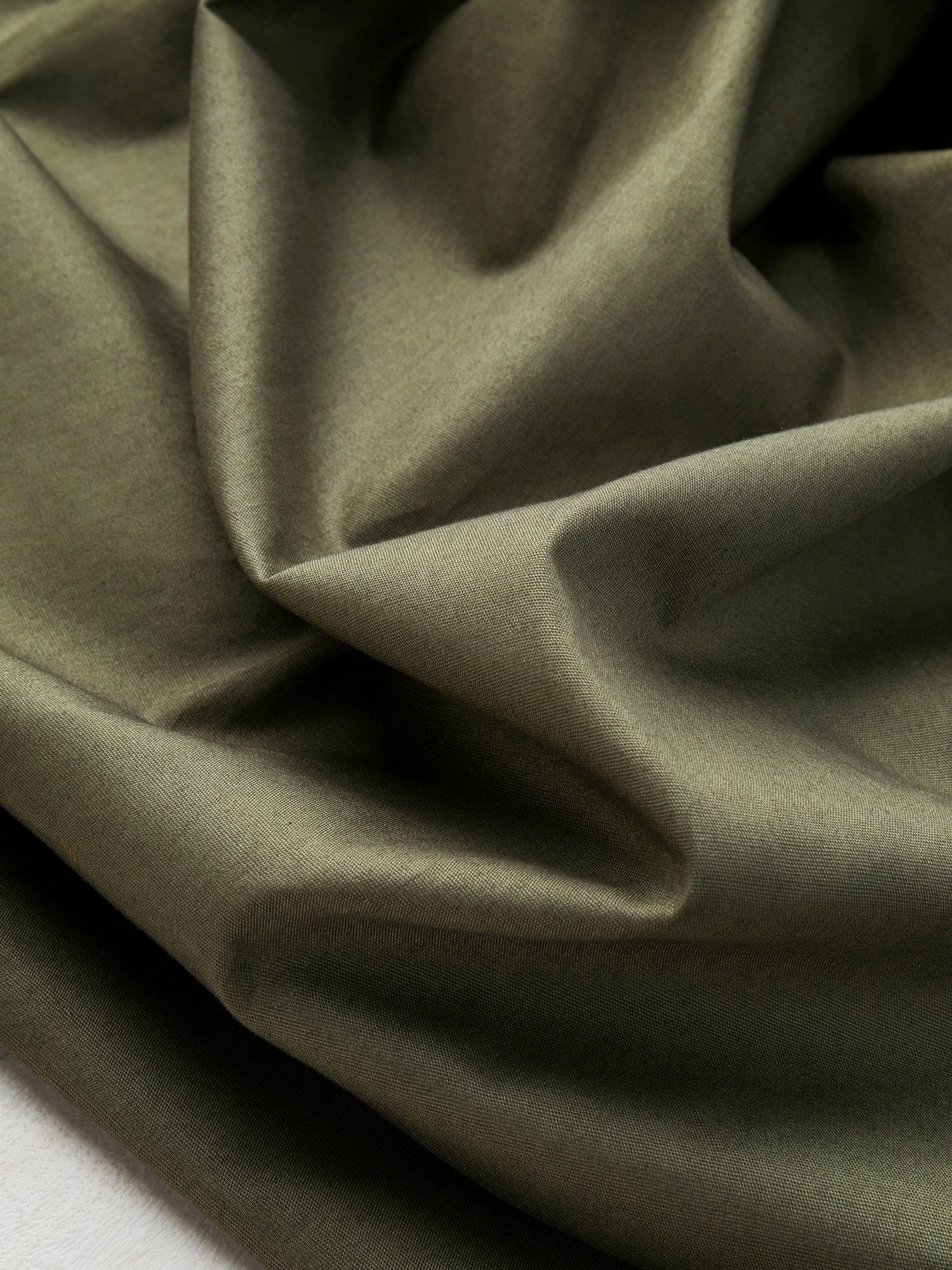 F-COT137-027-Lightweight-Silky-Cotton-Poplin-Dark-Olive-Core-Fabrics-scrunched.JPG