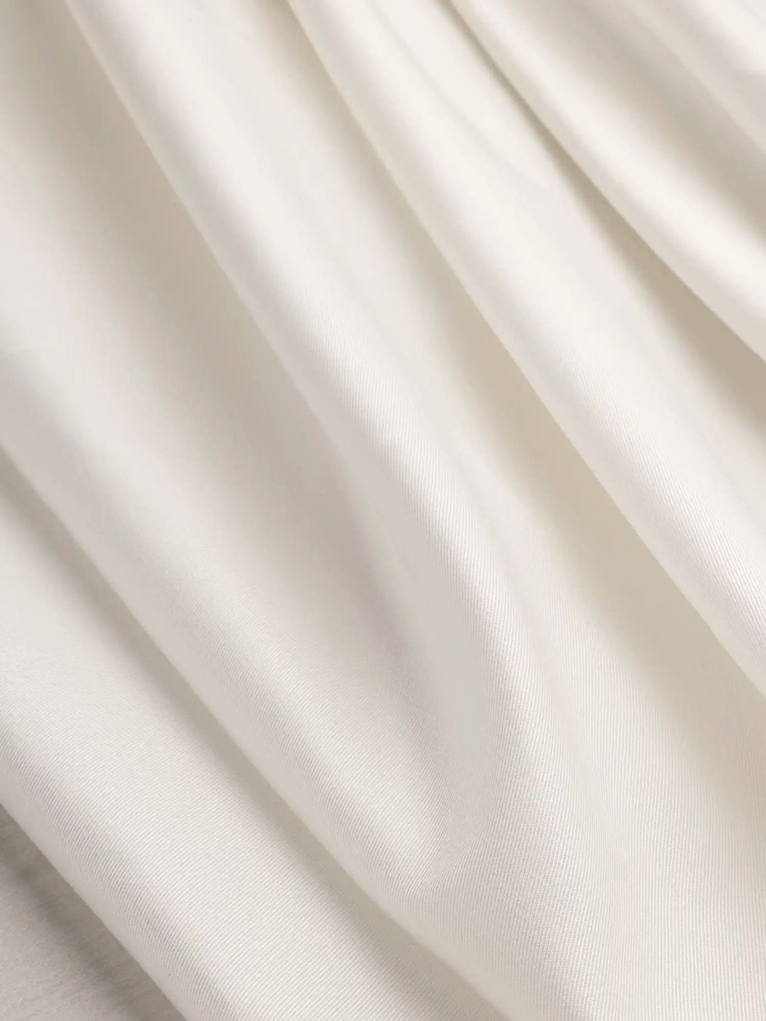 F-DEA180-Lightweight-Stretch-Cotton-Twill-Deadstock-Ivory-Core-Fabrics-scrunched.webp
