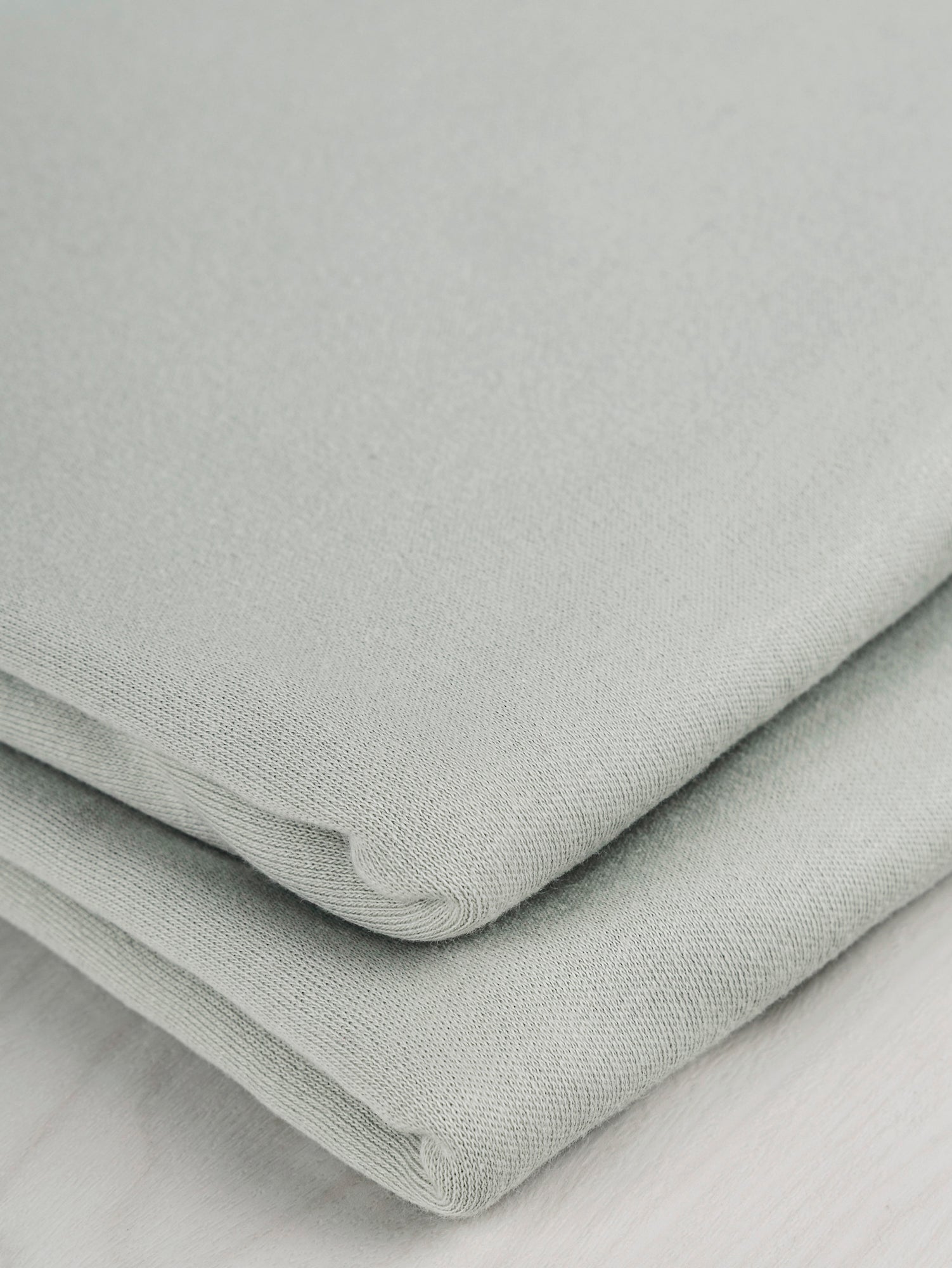 F-COT175-006-Luxe-Organic-Cotton-Jersey-Knit-Sea-Salt-Core-Fabrics-fold.JPG