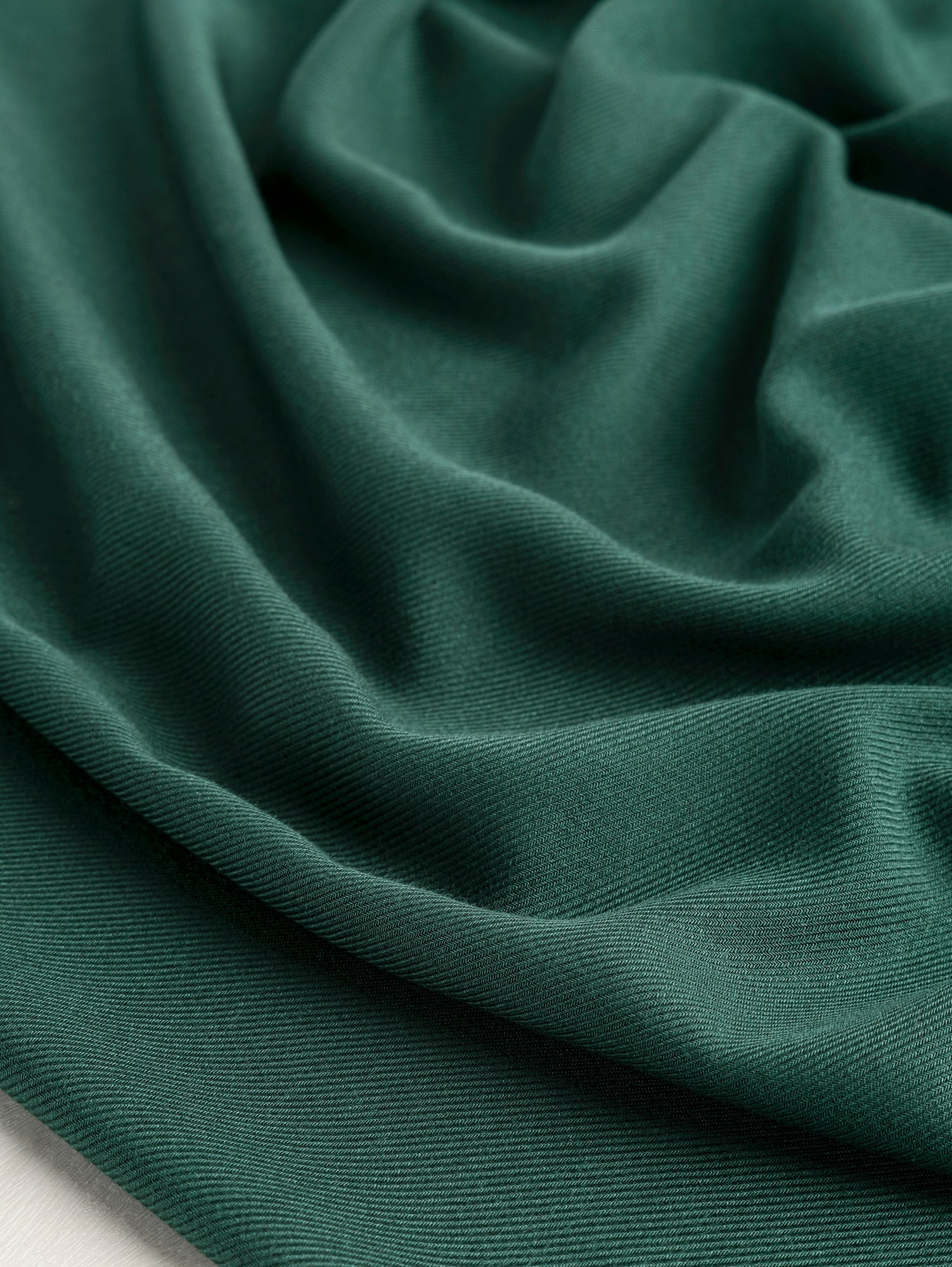 F-DEA058-Lyocell-Twill-Deadstock-Forest-Green-Core-Fabrics-scrunched.JPG