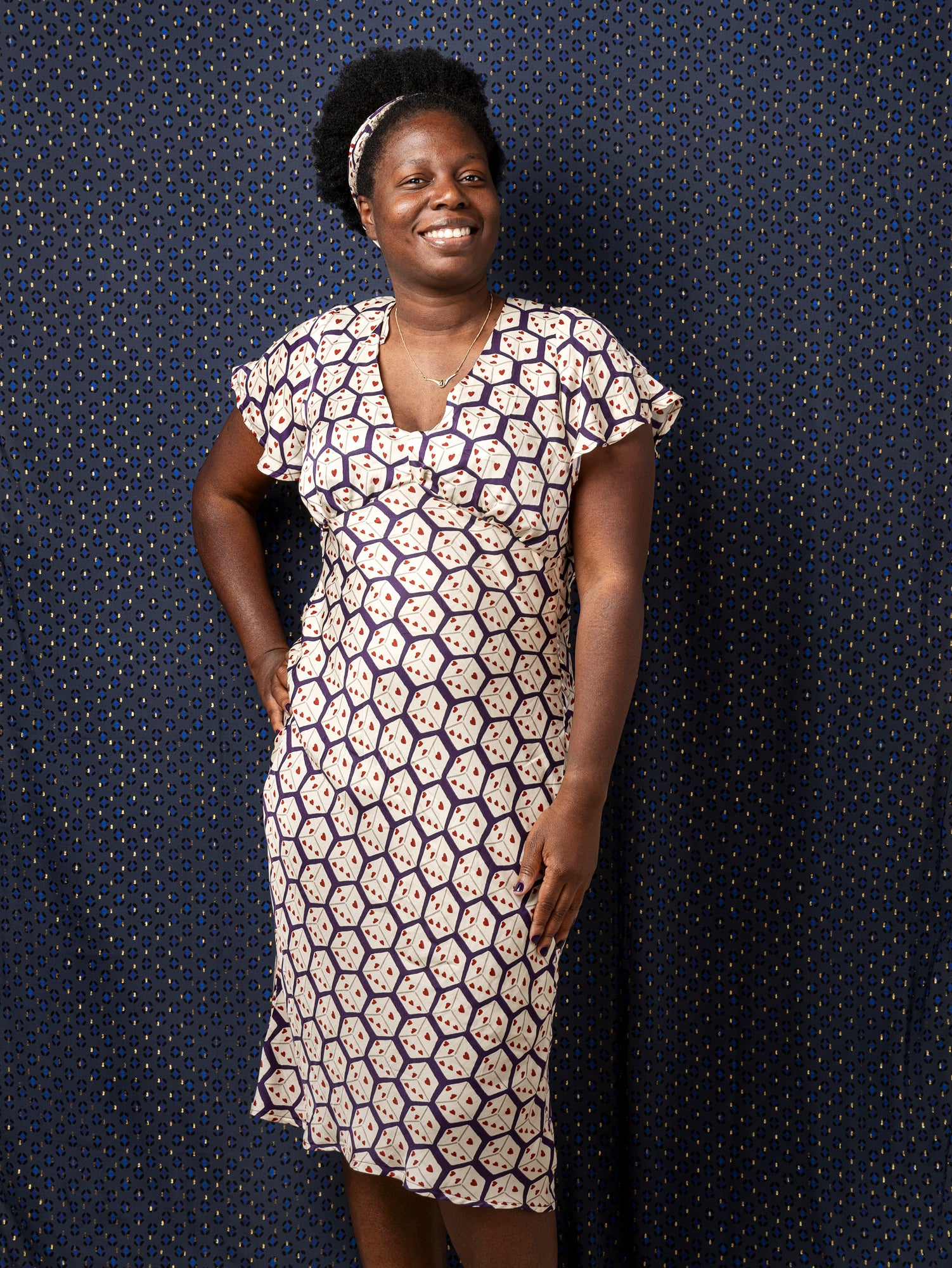 F-VIS275—Roll-The-Dice-Print-Viscose-Silk-Aubergine-Cream-Red-Core-Fabrics-model