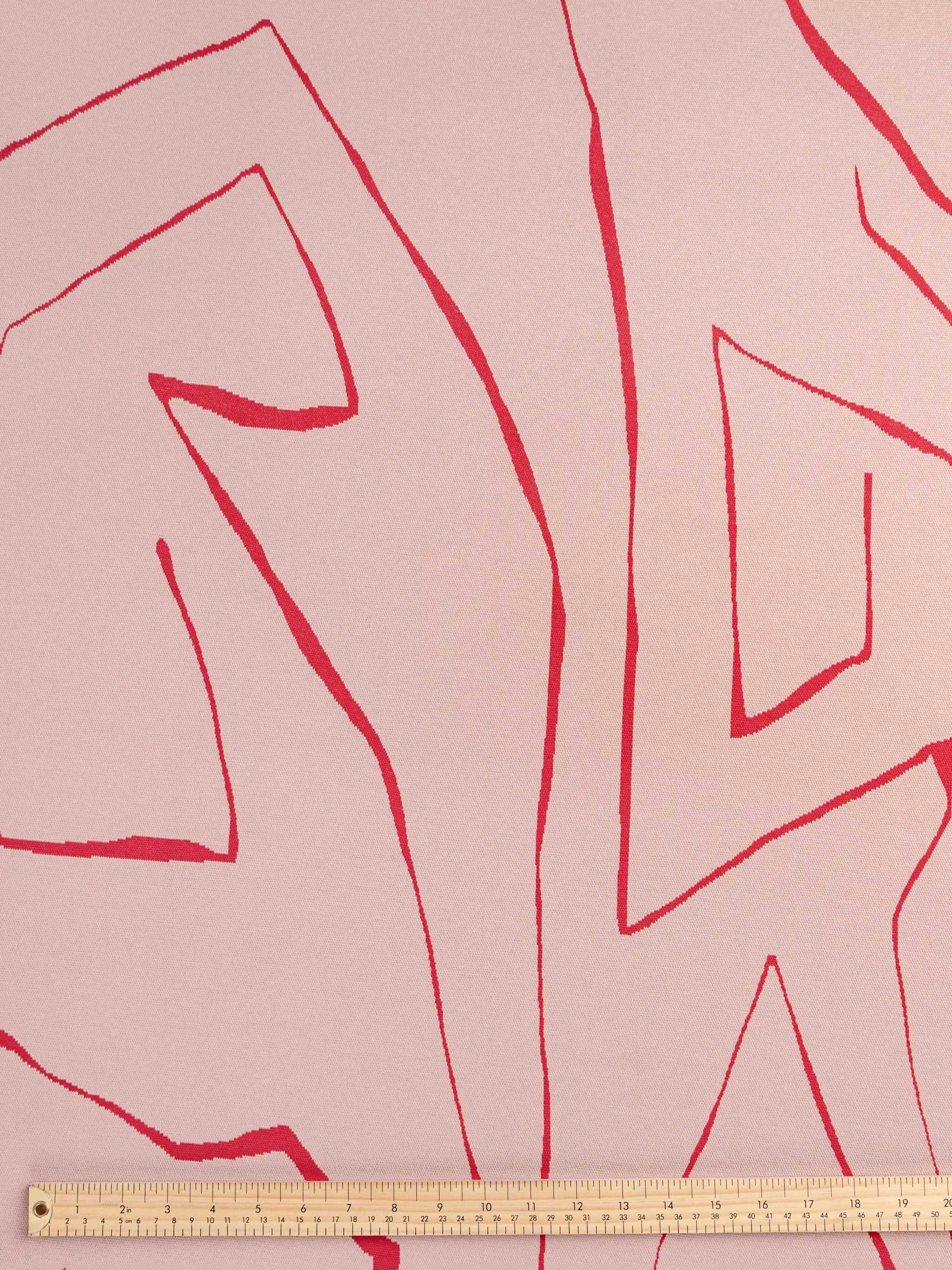 F-DEA147-Marble-Stretch-Double-Knit-Deadstock-Dusty-Rose-and-Magenta-Core-Fabrics-ruler.webp
