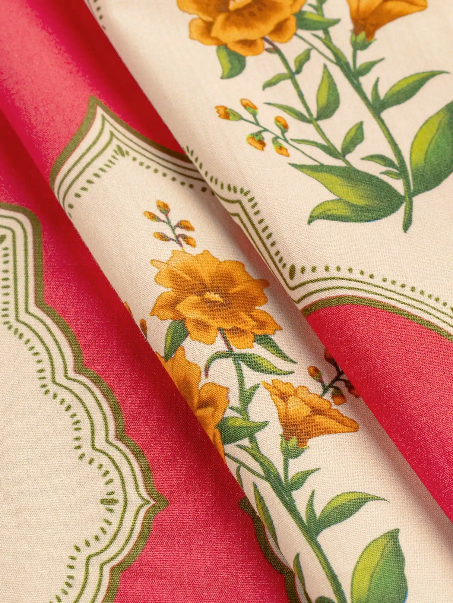 F-COT442-Marigold-Tile-Print-BCI-Cotton-Poplin-Oat-Basil-Cherry-and-Marigold-Core-Fabrics-fold.webp