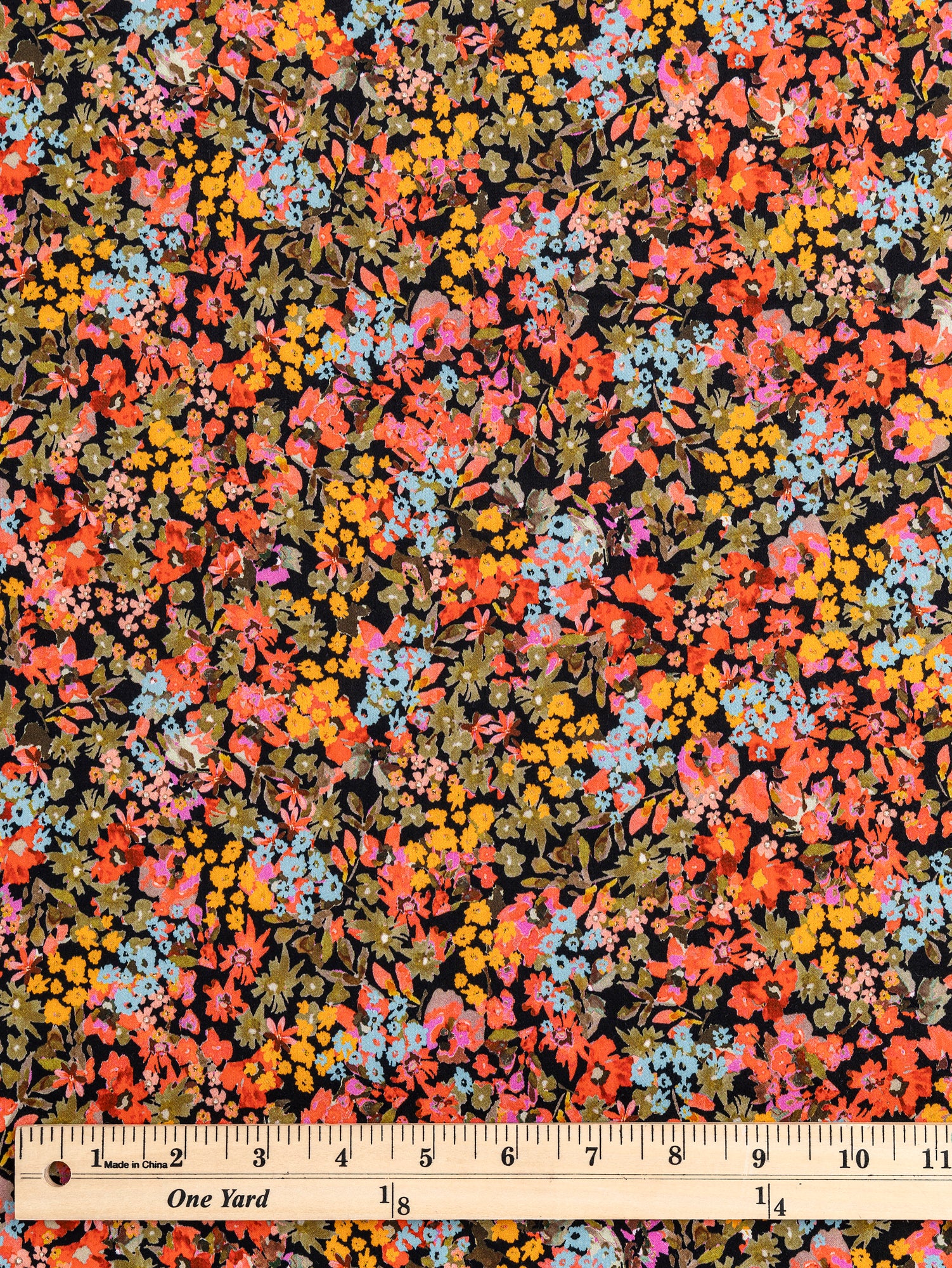 F-COT333-Meadow-Ditzy-Floral-Cotton-Lawn-Black-Multicolour-Core-Fabrics-ruler.JPG