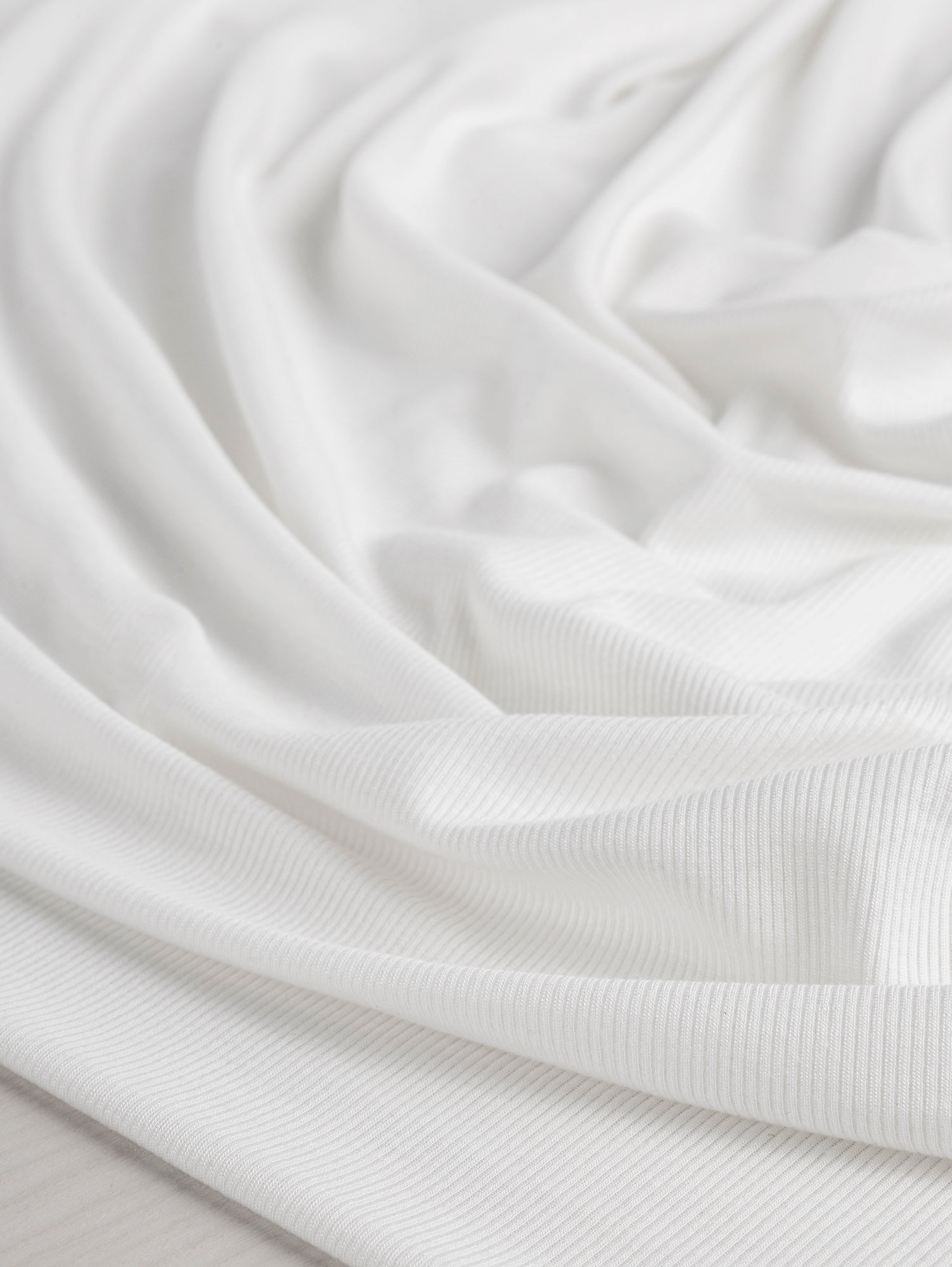 F-MOD004-002-MicroModal-Baby-Rib-Knit-White-Core-Fabrics-scrunched.JPG