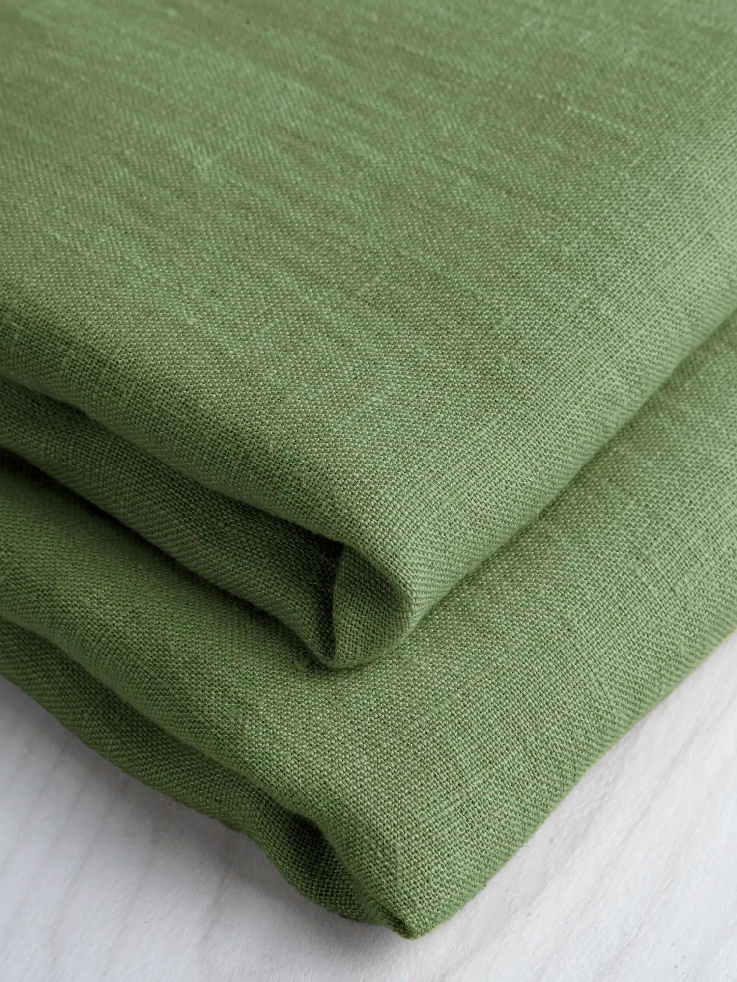 F-LIN020-045-Midweight-European-Linen-Basil-Core-Fabrics-fold.webp