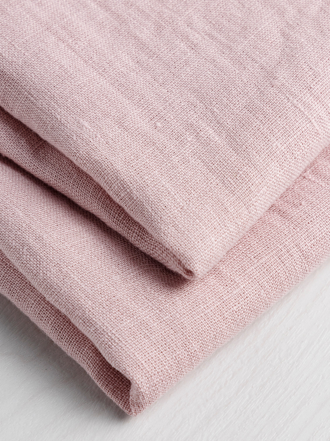 F-LIN020-006-MediumWeightCoreCollectionLinen-DustyRose-CoreFabrics-fold