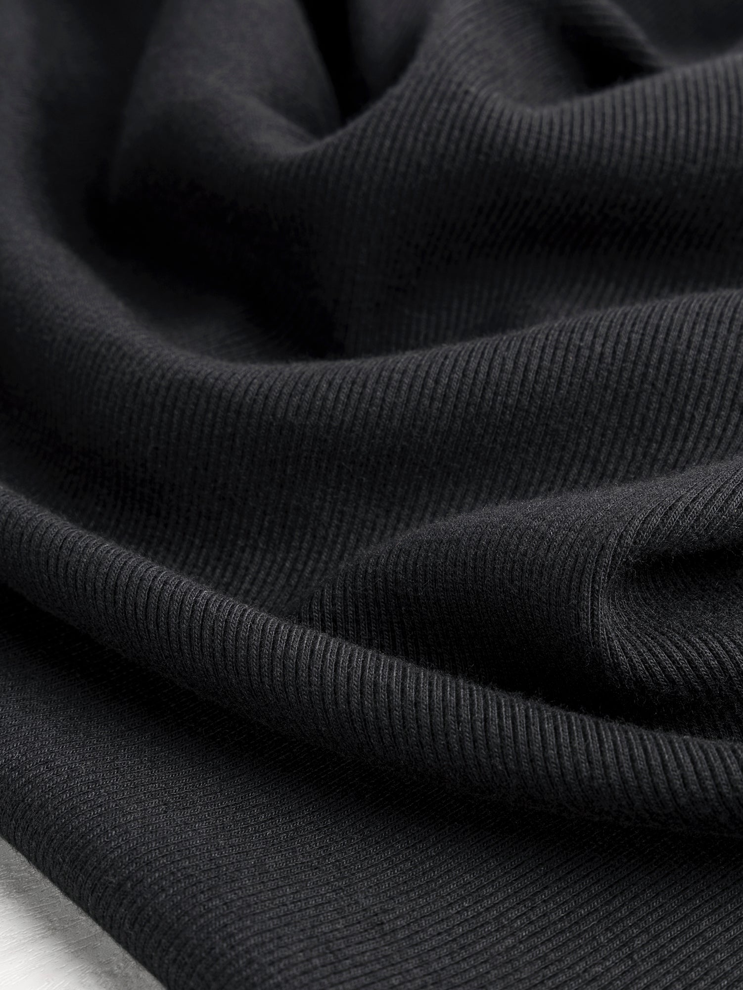 F-DEA086-004-Midweight-Organic-Cotton-2-1-Rib-Knit-Deadstock-Black-Core-Fabrics-scrunched.JPG