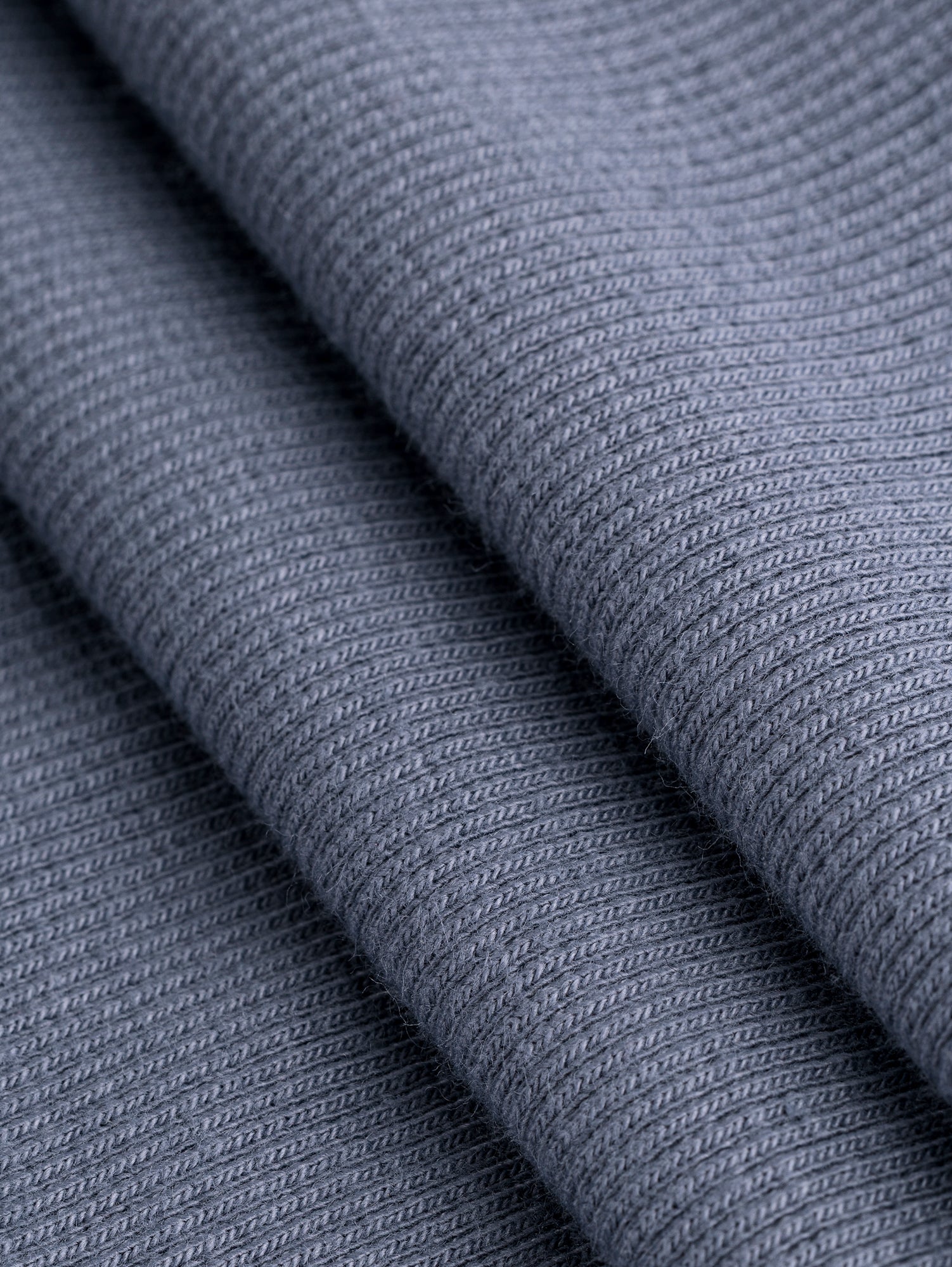 F-DEA086-003-Midweight-Organic-Cotton-2-1-rib-Knit-Deadstock-Grey-Core-Fabrics-fold.JPG