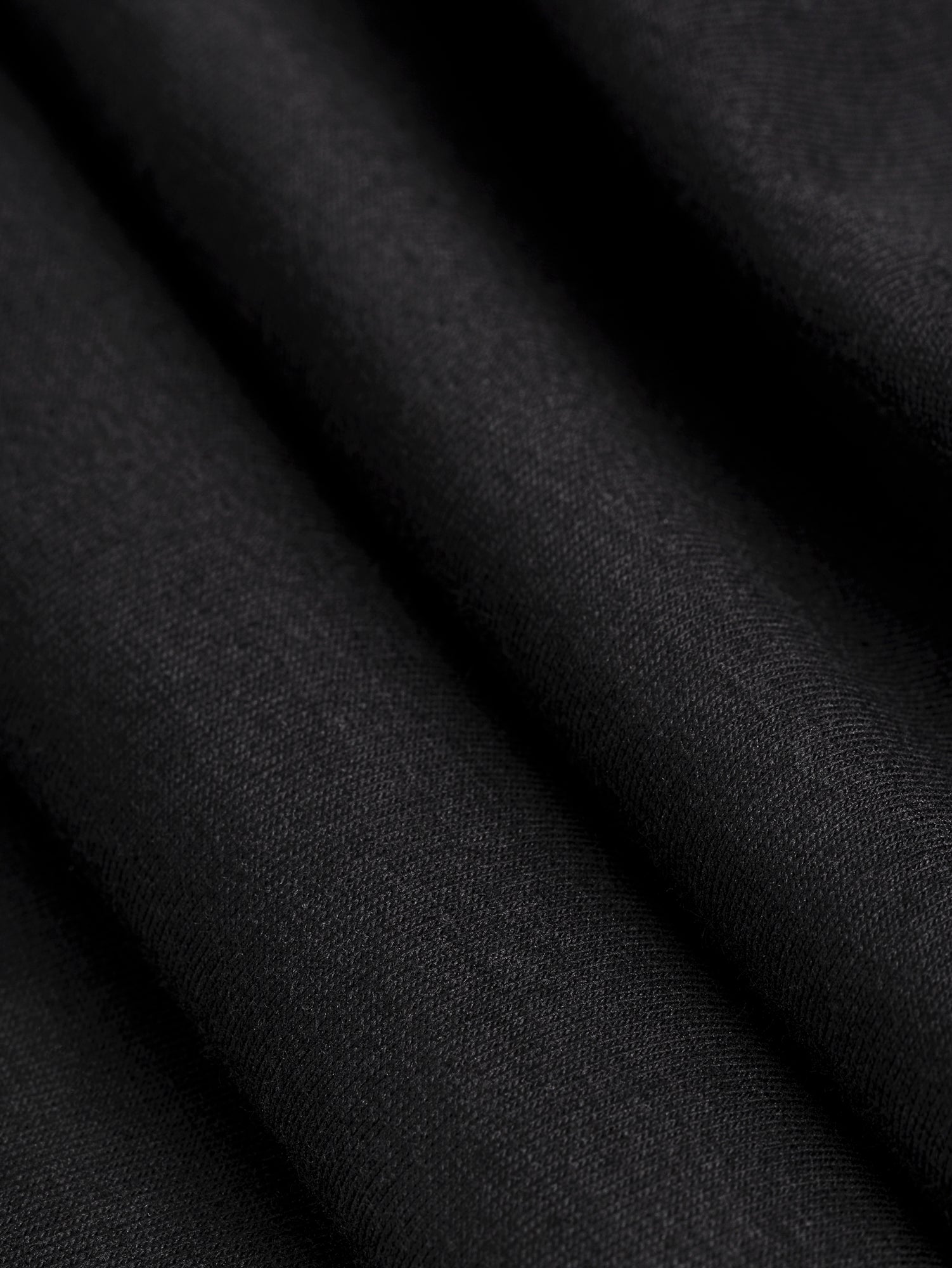 F-DEA085-002-Midweight-Organic-Cotton-Spandex-Jersey-Knit-Deadstock-Black-Core-Fabrics-fold.JPG