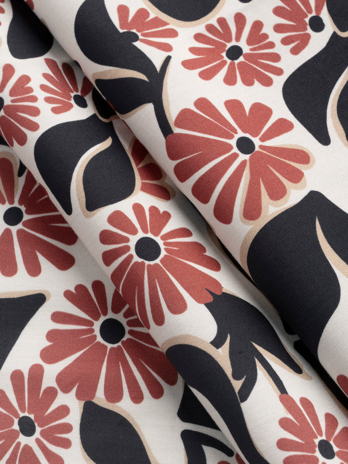 F-COT479-Mod-Flower-Print-BCI-Cotton-Poplin-Ivory-Red-Earth-and-Black-Core-Fabrics-fold.webp