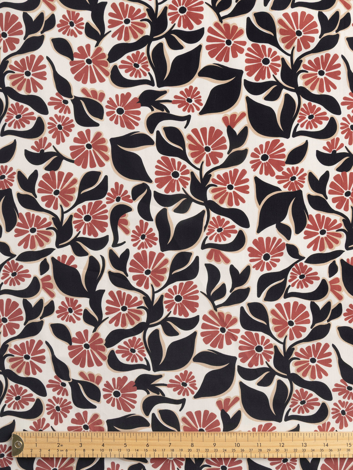 F-COT479-Mod-Flower-Print-BCI-Cotton-Poplin-Ivory-Red-Earth-and-Black-Core-Fabrics-ruler.webp