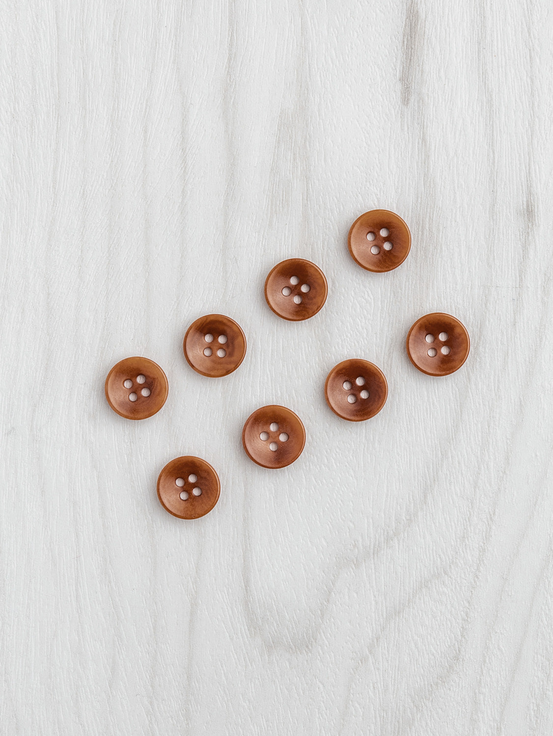 N-BUT021-006-Corozo-nut-button-4-hole-12mm-1_2-inch-8-pack-Rust-Core-Fabrics.jpg