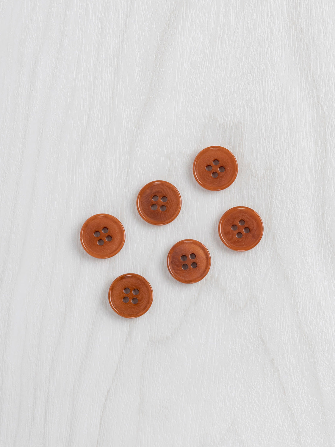 N-BUT022-Corozo-Nut-Buttons-16mm-6-pack-Rust-Core-Fabrics.jpg