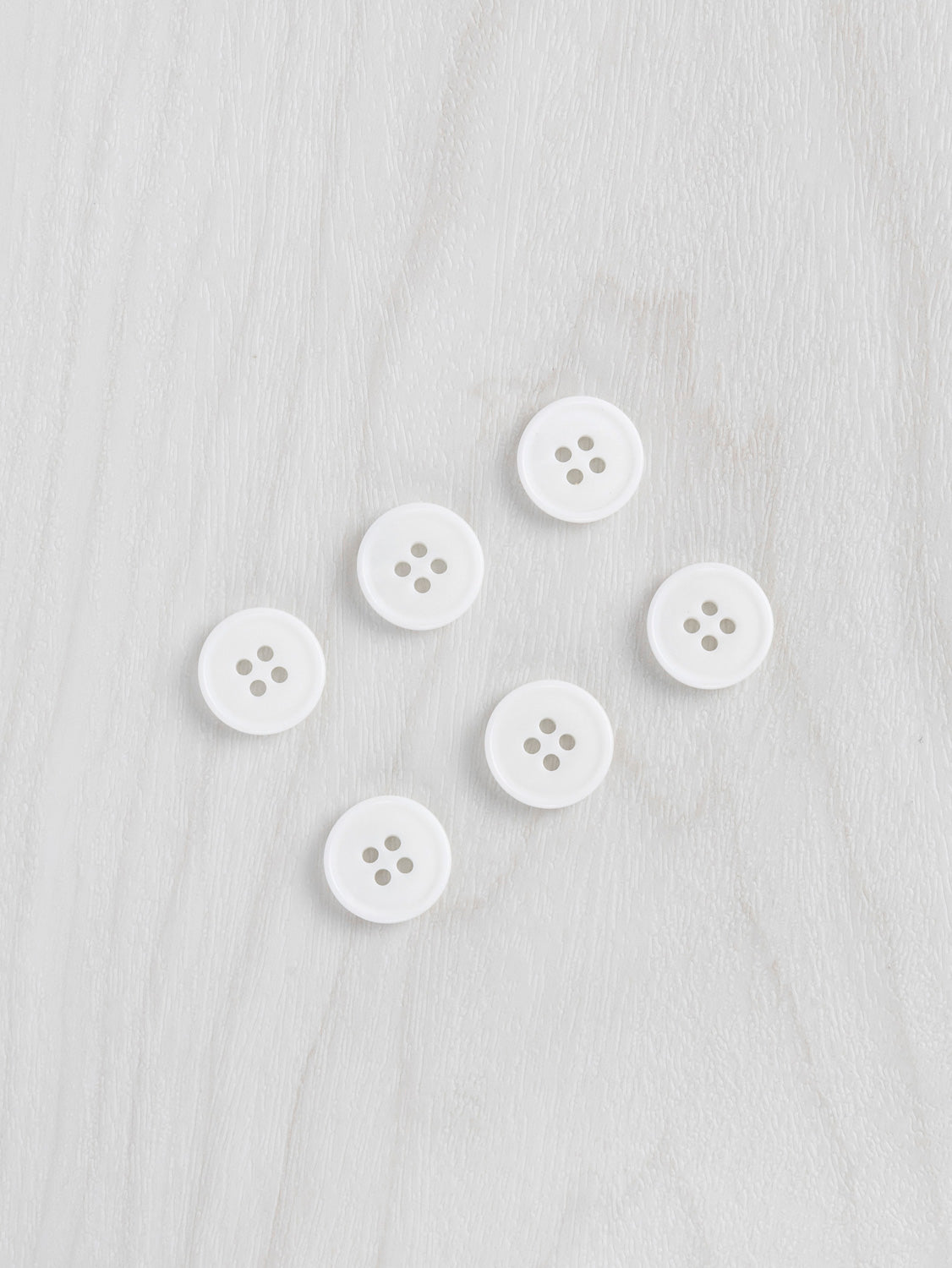 N-BUT022-Corozo-Nut-Buttons-16mm-6-pack-White-Core-Fabrics.jpg