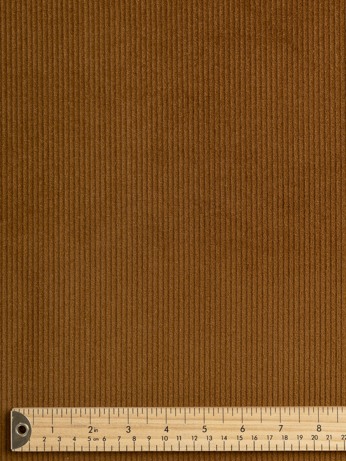 F-COT505-002-Non-Stretch-8-Wale-Cotton-Corduroy-Caramel-Core-Fabrics-ruler.webp