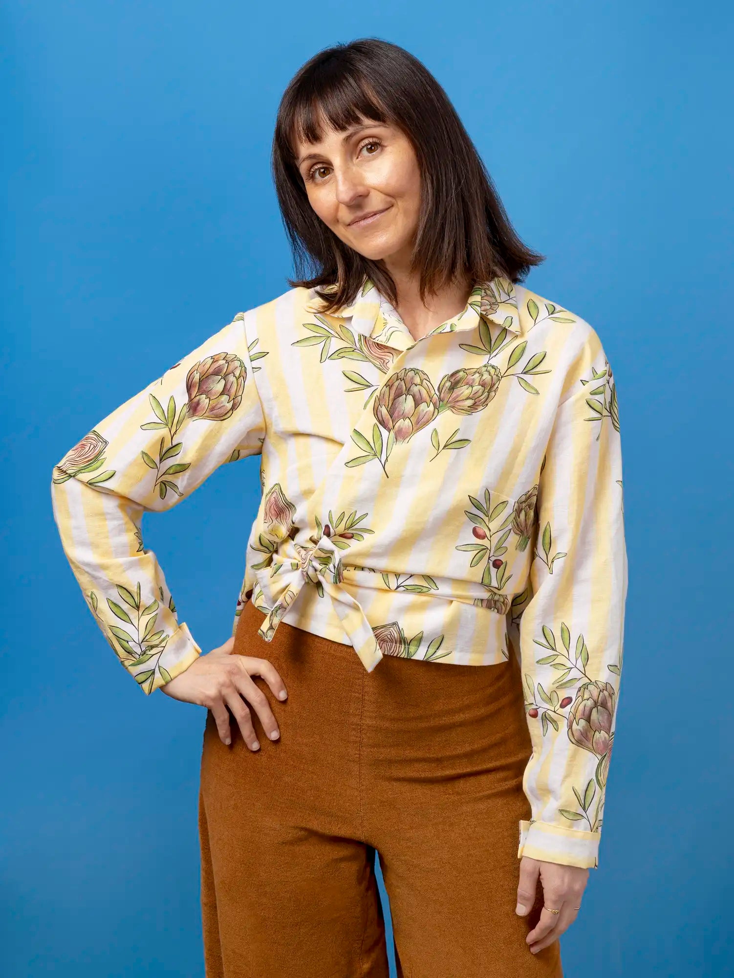 F-COT470-Okie-Dokie-Artichokie-Stripe-Print-Organic-Cotton-Linen-Butter-Yellow+White-and-Olive-Core-Fabrics-model.webp