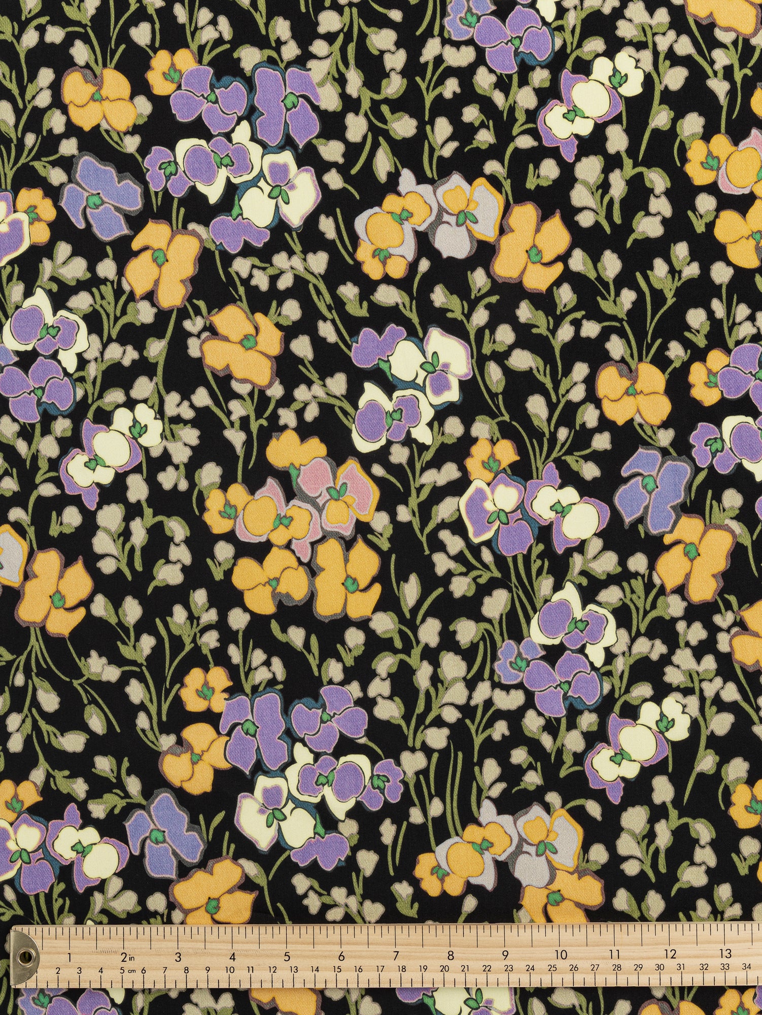 F-COT393-Orchids-Lilies-Of-The-Valley-Print-Cotton-Sateen-Black-Purple-Green-and-Orange-Core-Fabrics-ruler.JPG
