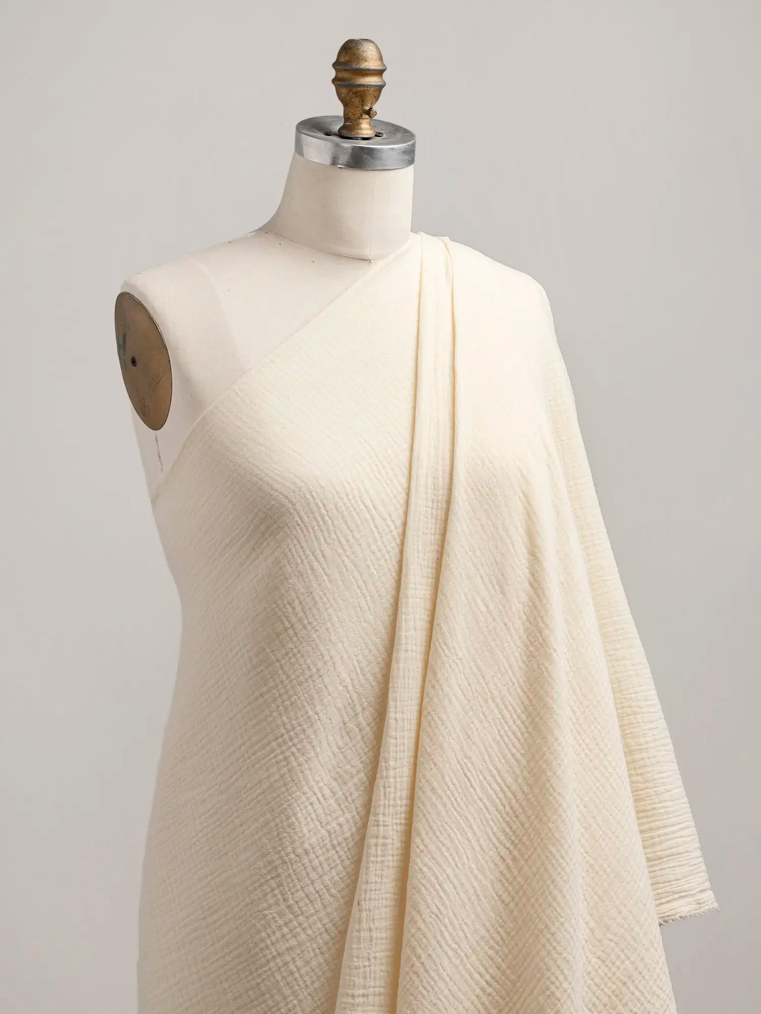 F-COT102-023-Organic-Cotton-Double-Gauze-Butter-Yellow-Core-Fabrics-draped.webp