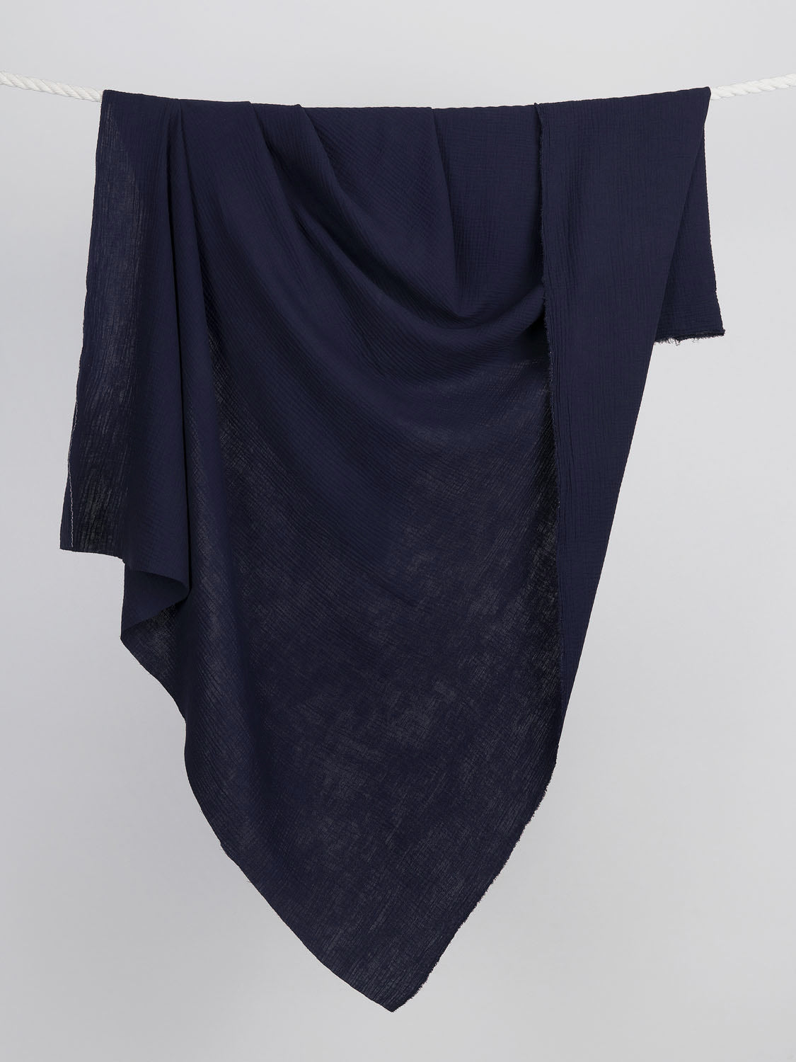 F-COT102-021-Organic-Cotton-Double-Gauze-Navy-Core-Fabrics-draped