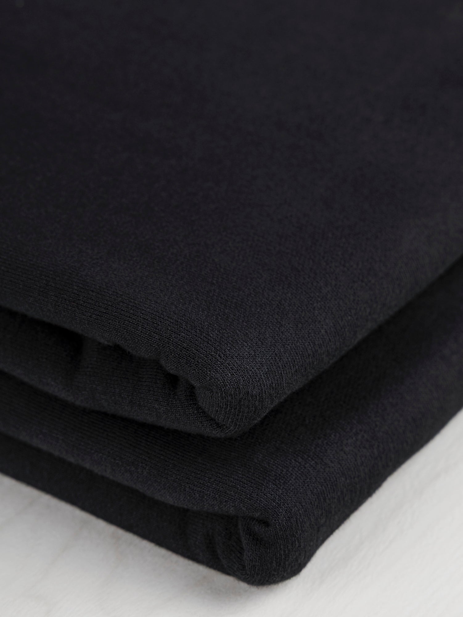 F-COT364-001-Organic-Cotton-Heavy-French-Terry-Black-Core-Fabrics-fold.JPG