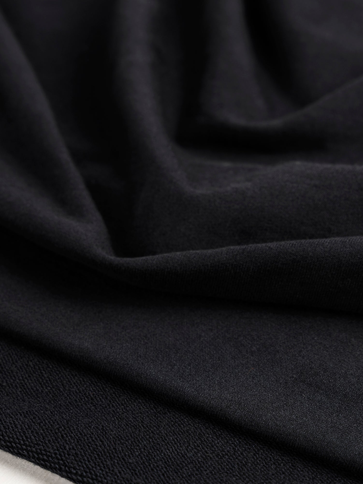 F-COT364-001-Organic-Cotton-Heavy-French-Terry-Black-Core-Fabrics-scrunched.JPG