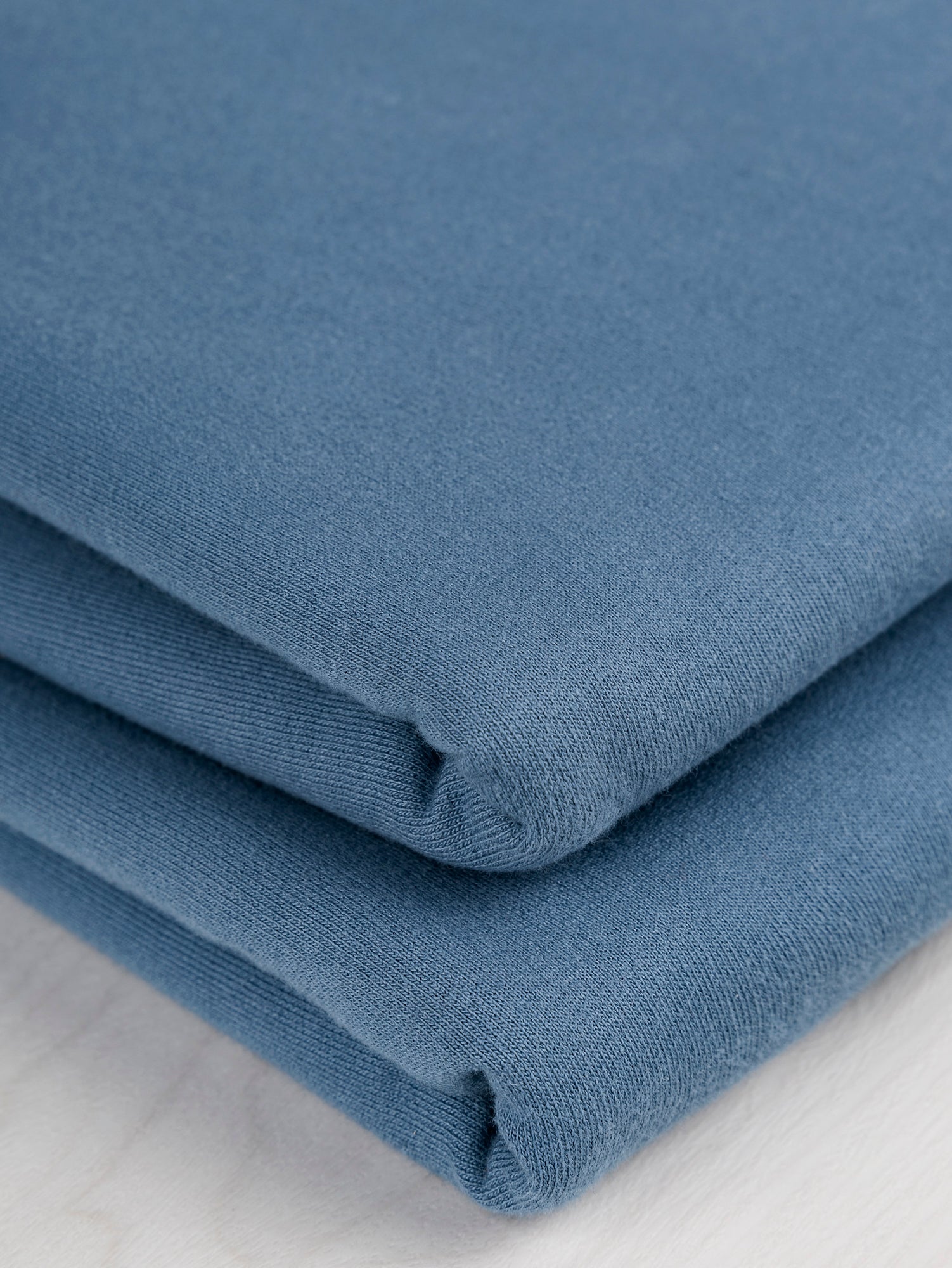 F-COT364-011-Organic-Cotton-Heavy-French-Terry-Steel-Blue-Core-Fabrics-fold.JPG