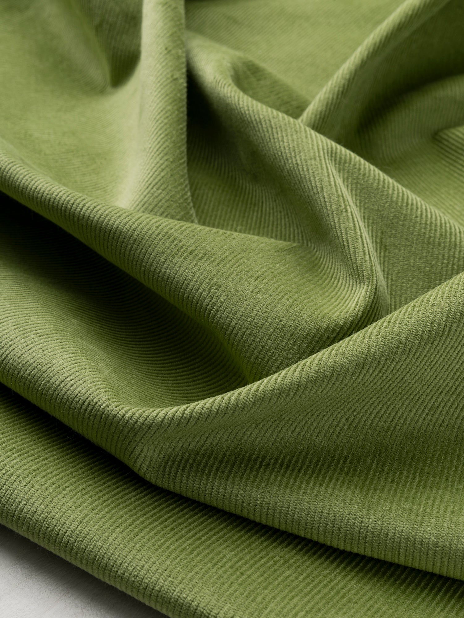 F-COT397-001-Organic-Cotton-Lycra-Slight-Stretch-14-Wale-Corduroy-Dill-Green-Core-Fabrics-scrunched.JPG