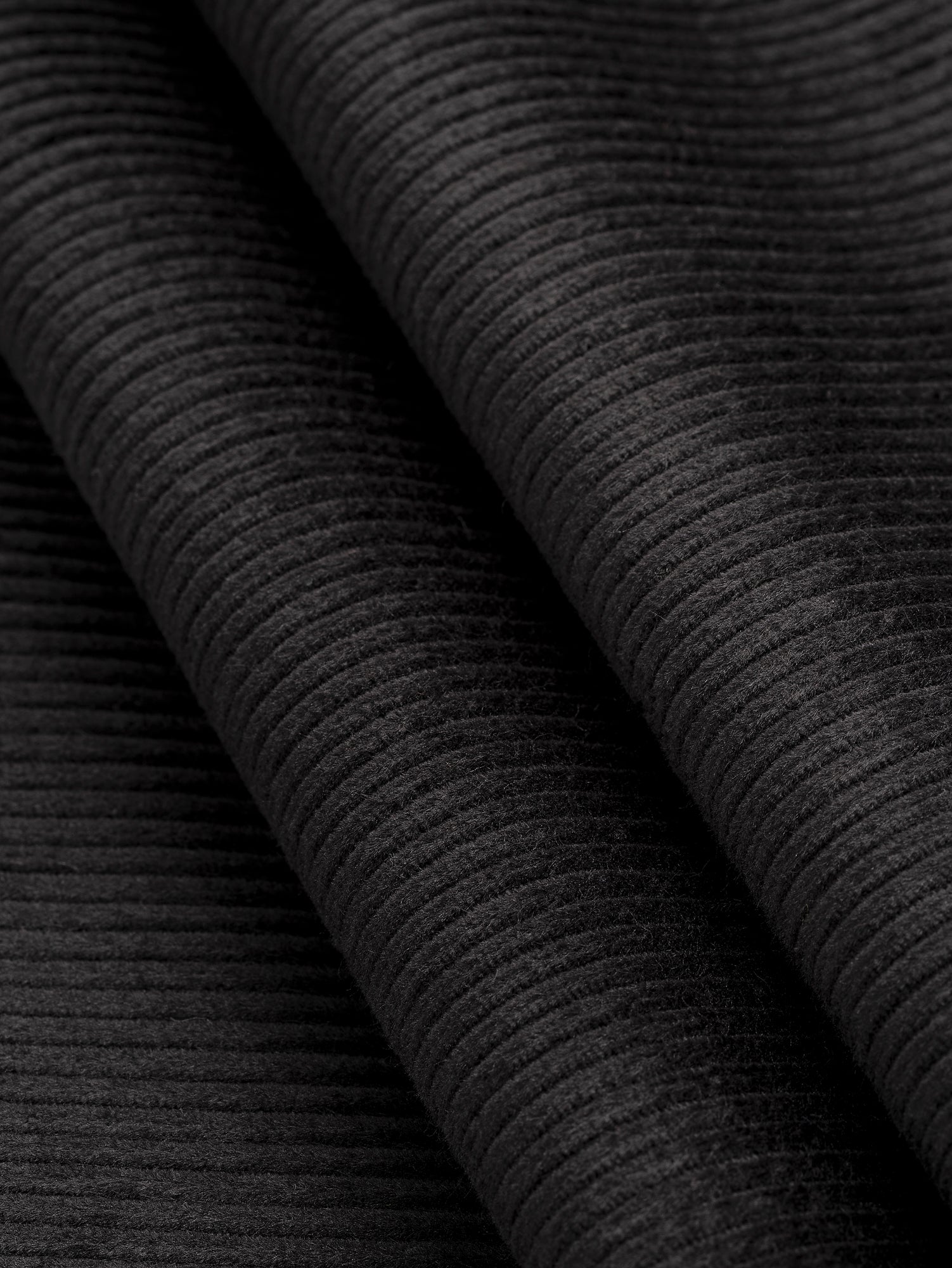 F-COT398-004-Organic-Cotton-Non-Stretch-8-Wale-Corduroy-Black-Core-Fabrics-fold.JPG