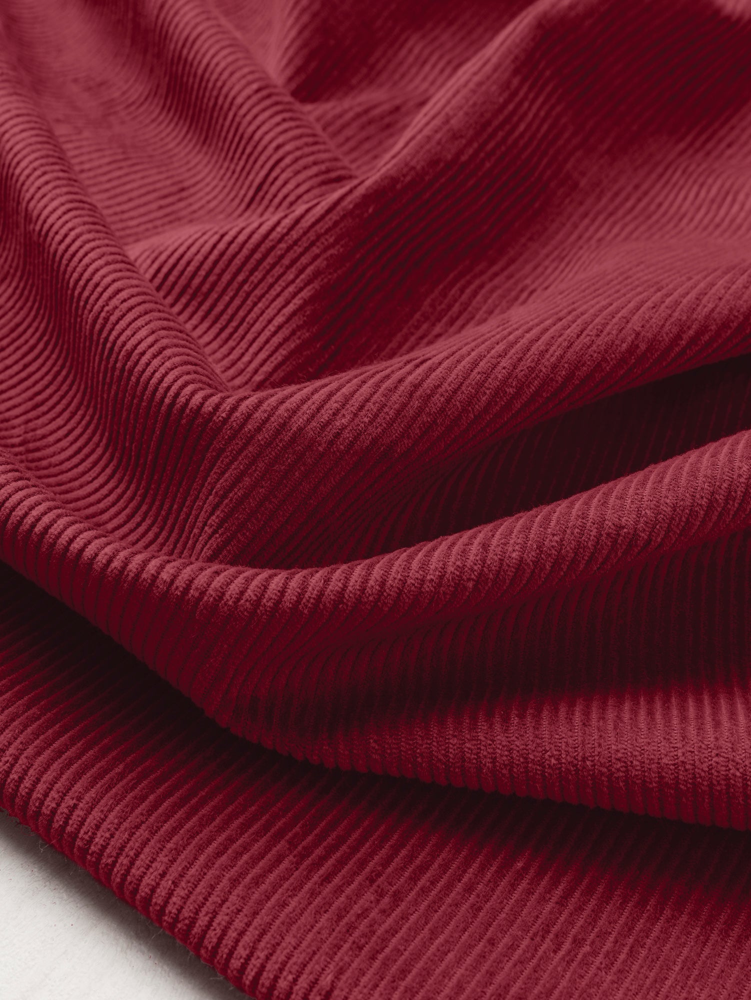 F-COT398-003-Organic-Cotton-Non-Stretch-8-Wale-Corduroy-Bordeaux-Core-Fabrics-scrunched.JPG