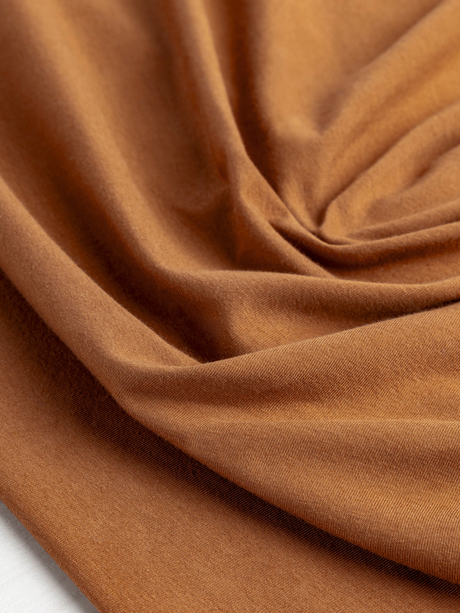 F-COT409-005 - Organic Cotton Spandex Jersey - Caramel - Core Fabrics-scrunched.JPG