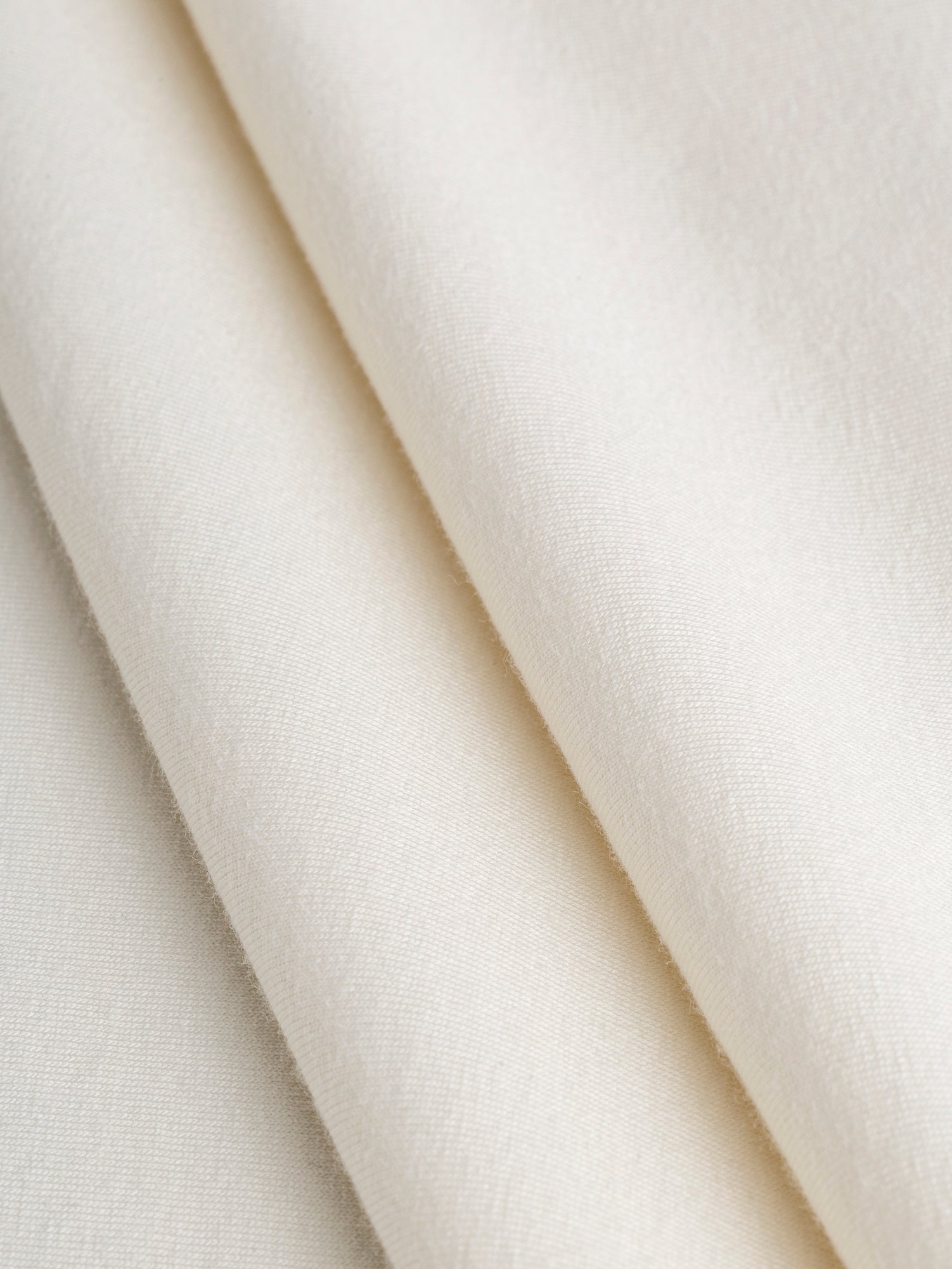 F-COT409-001 - Organic Cotton Spandex Jersey - Cream - Core Fabrics- Fold.JPG