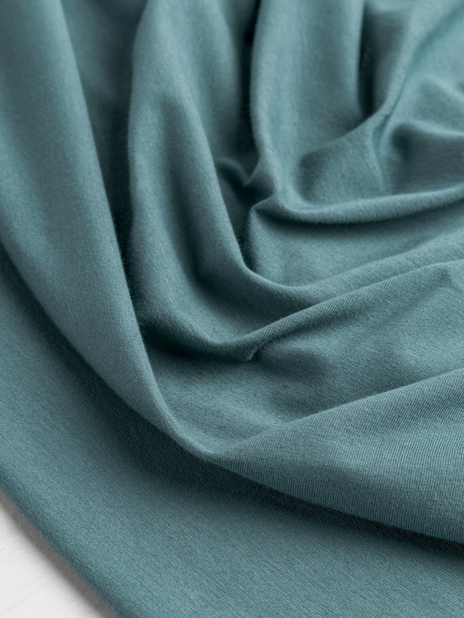F-COT409-004 - Organic Cotton Spandex Jersey - Eucalyptus - Core Fabrics- scrunched.JPG