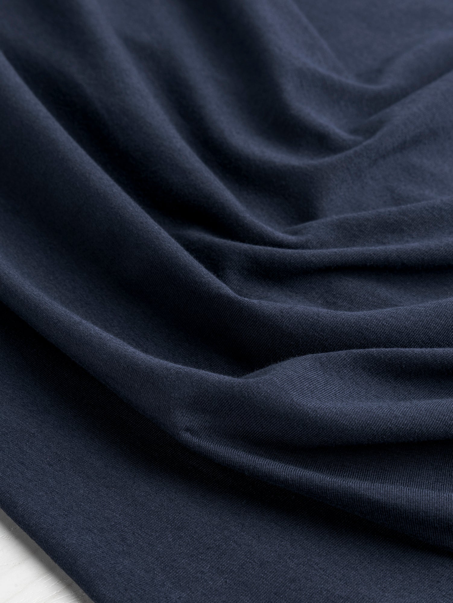 F-COT409-003 - Organic Cotton Spandex Jersey - Indigo - Core Fabrics- scrunched.JPG