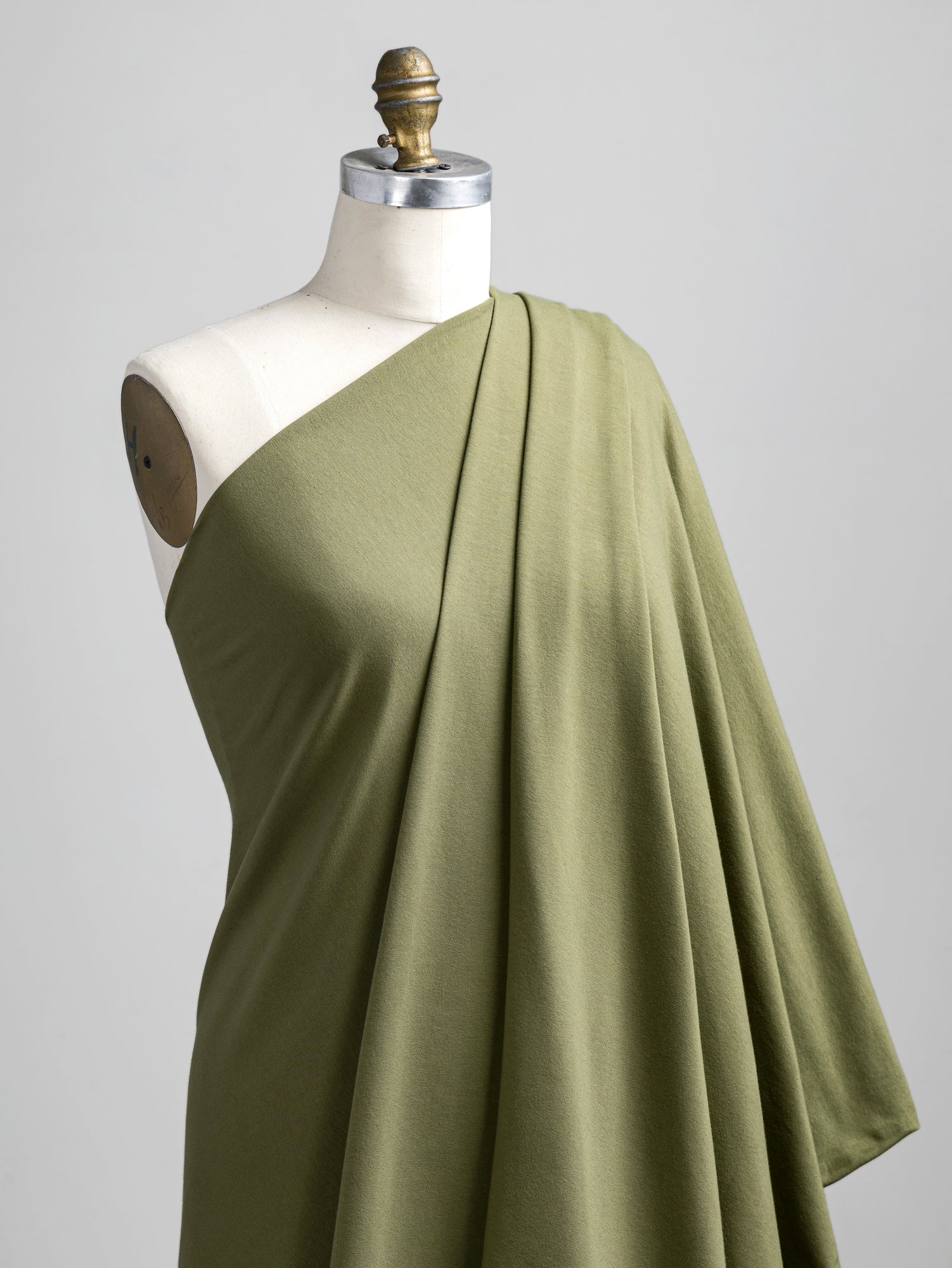F-COT409-006 - Organic Cotton Spandex Jersey - Olive - Core Fabrics-draped.JPG