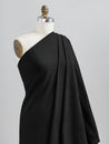 F-COT363-001-Organic-Cotton-Spandex-Jersey-Knit-Black-Core-Fabrics-draped.JPG