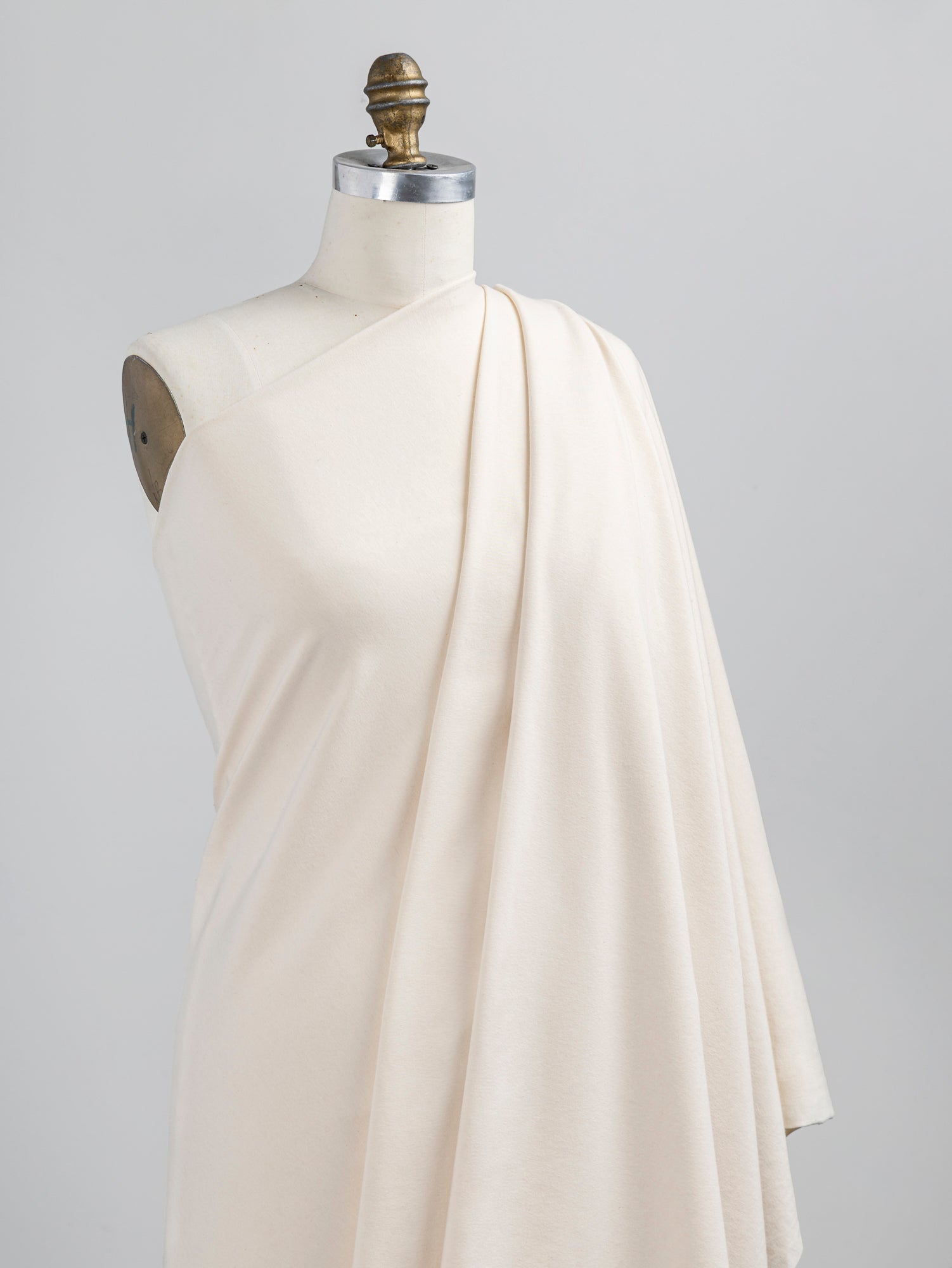 F-COT363-009-Organic-Cotton-Spandex-Jersey-Knit-Natural-Core-Fabrics-draped.JPG