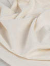 F-COT363-009-Organic-Cotton-Spandex-Jersey-Knit-Natural-Core-Fabrics-scrunched.JPG