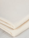 F-COT363-009-Organic-Cotton-Spandex-Jersey-Knit-Natural-Core-Fabrics-fold.JPG