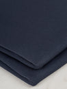 F-COT363-002-Organic-Cotton-Spandex-Jersey-Knit-Navy-Core-Fabrics-fold.JPG