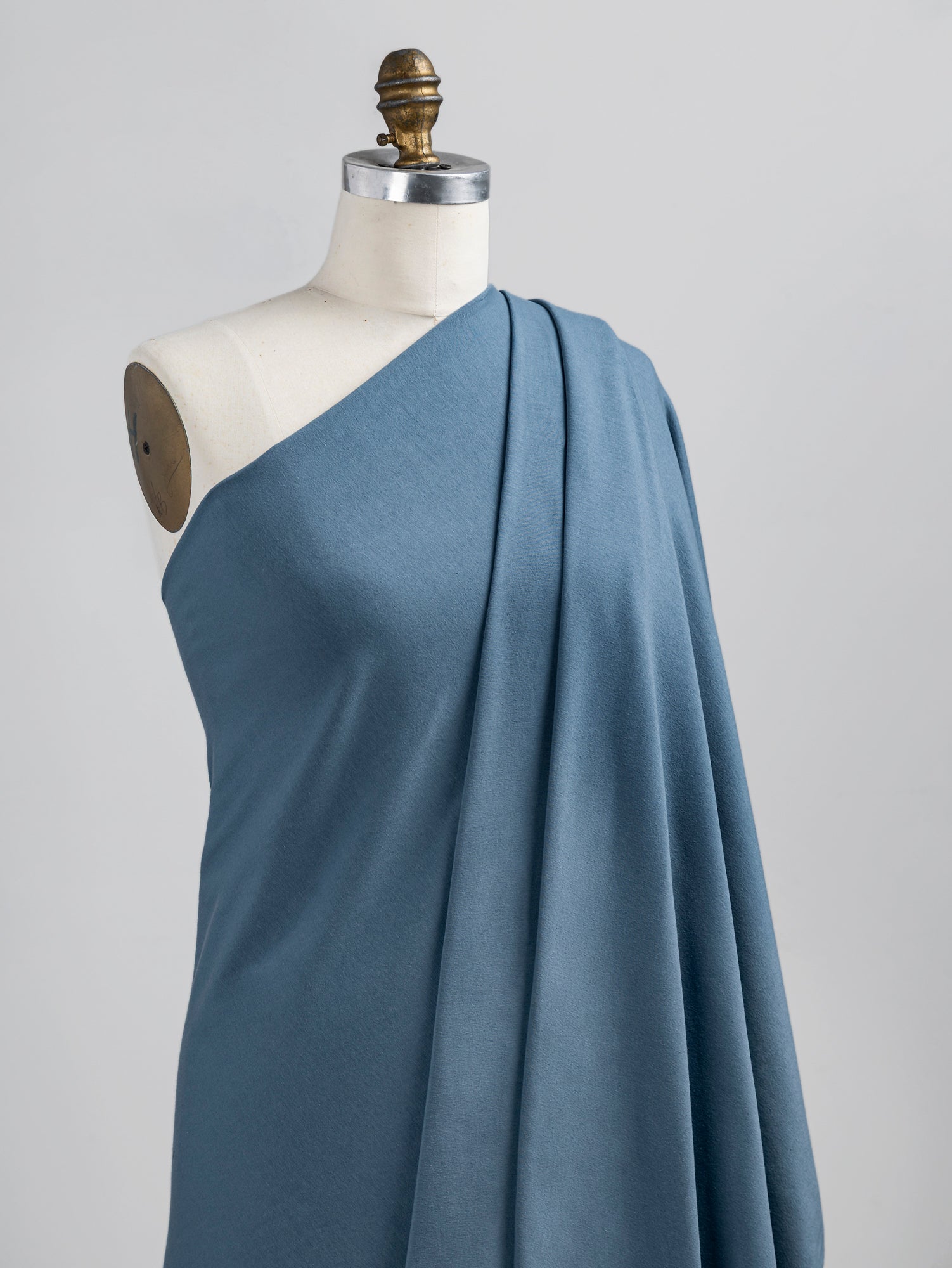 F-COT363-011-Organic-Cotton-Spandex-Jersey-Knit-Steel-Blue-Core-Fabrics-draped.JPG